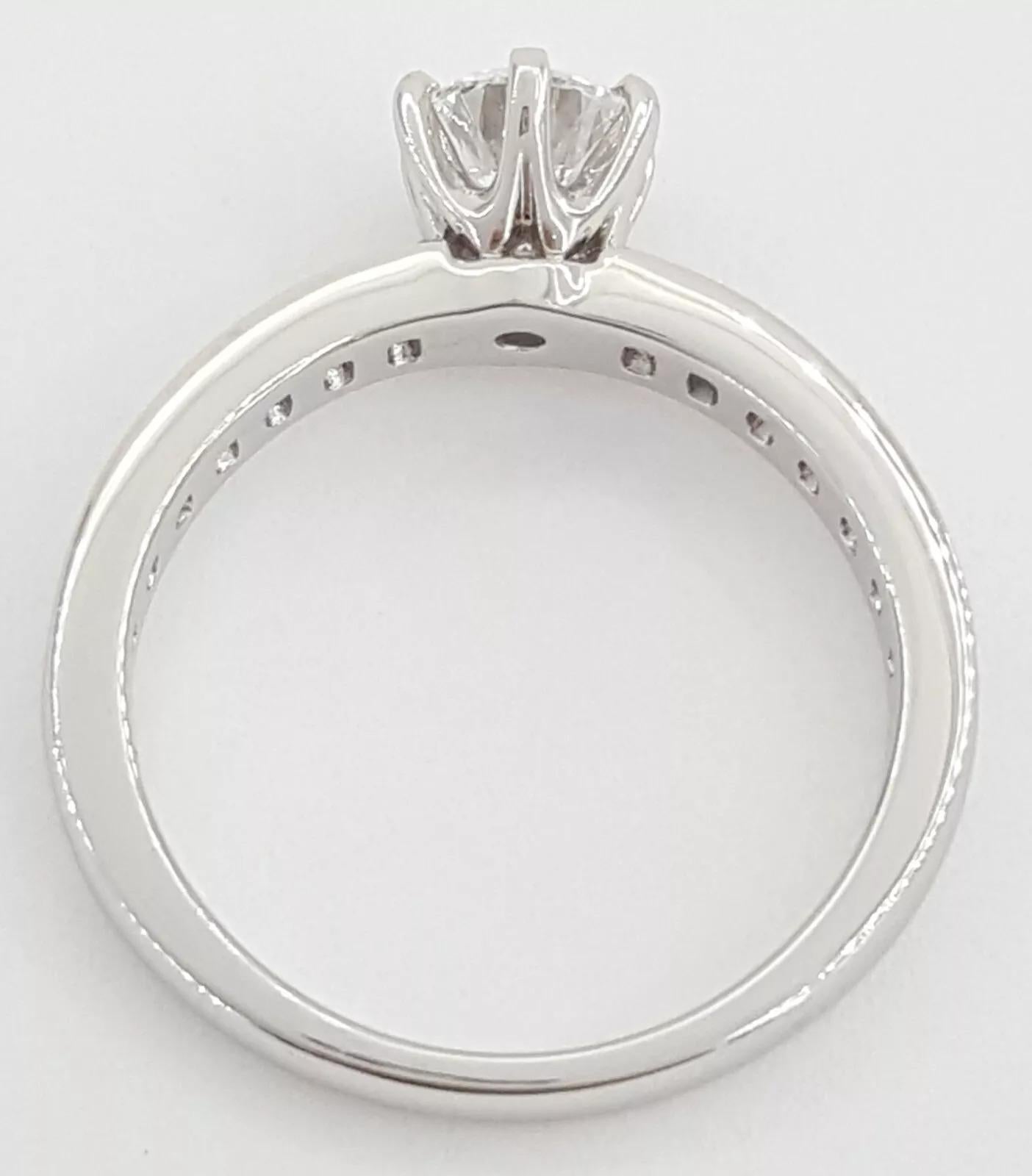 Women's or Men's Tiffany & Co. Platinum Channel-Set Diamond Engagement Ring For Sale