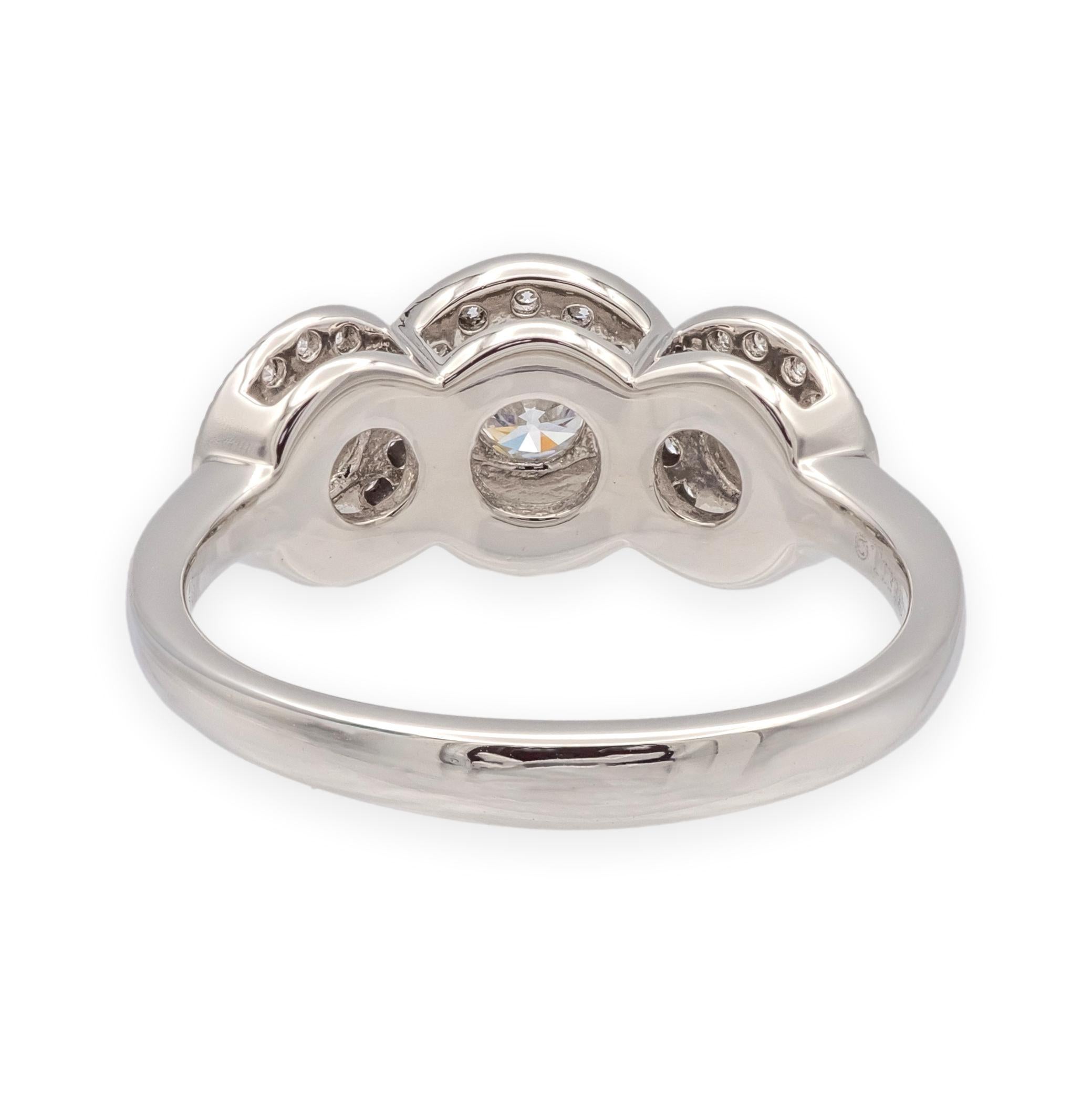 Contemporary Tiffany & Co. Platinum Circlet 3-Stone Halo Diamond Ring – .90 Ct Total Weight For Sale
