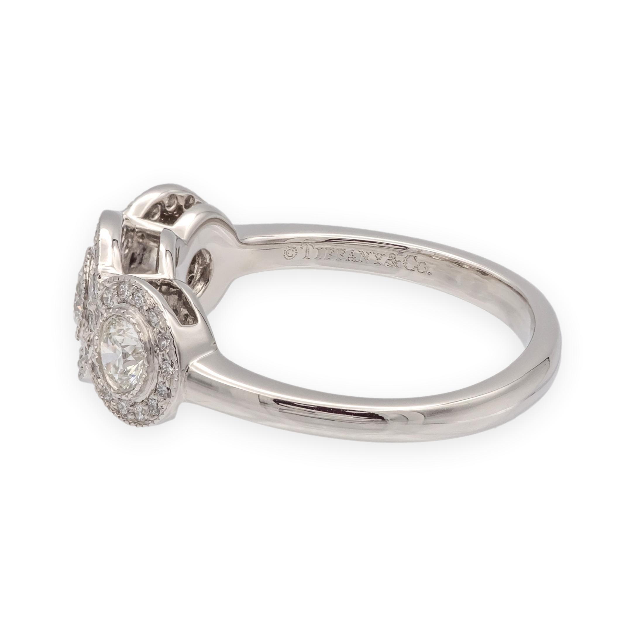 Brilliant Cut Tiffany & Co. Platinum Circlet 3-Stone Halo Diamond Ring – .90 Ct Total Weight For Sale