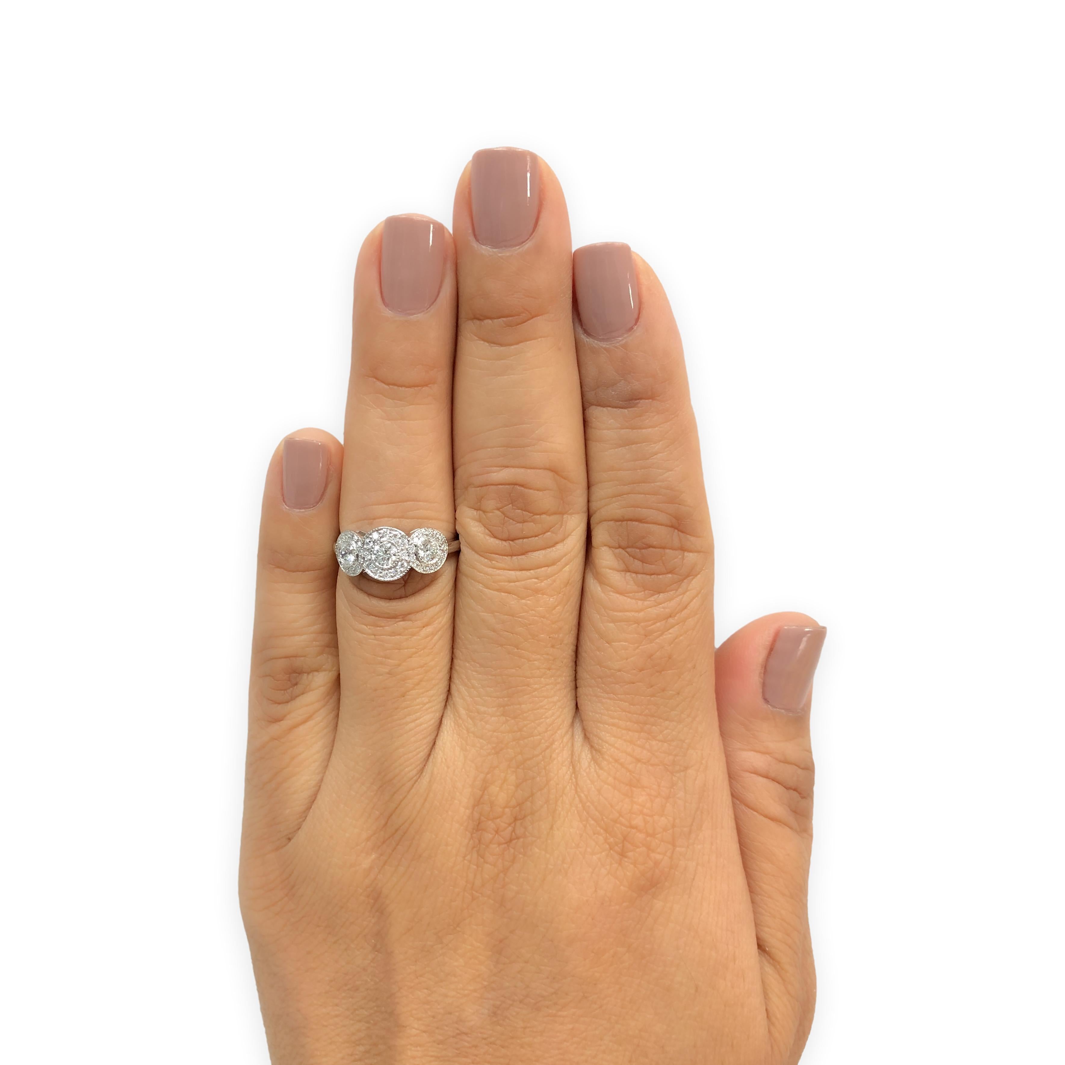 Tiffany & Co. Platinum Circlet 3-Stone Halo Diamond Ring – .90 Ct Total Weight For Sale 1