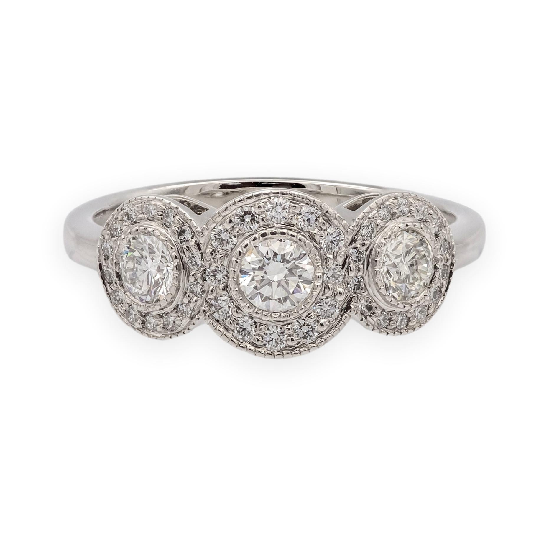 Tiffany & Co. Platinum Circlet 3-Stone Halo Diamond Ring – .90 Ct Total Weight For Sale