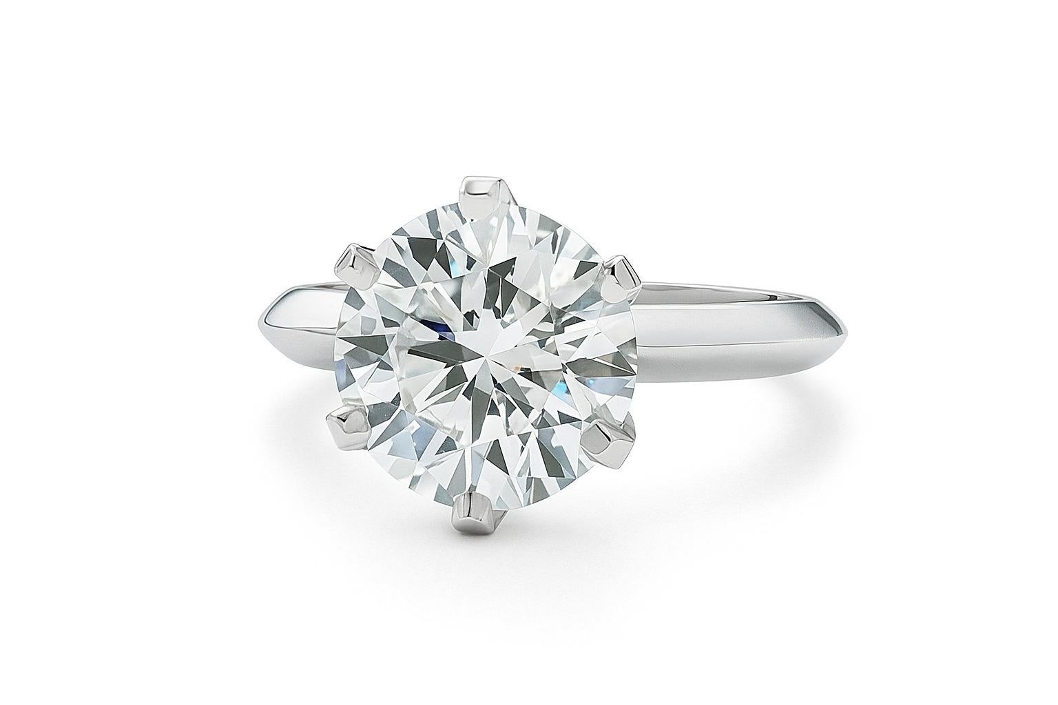 Taille ronde Tiffany & Co. Bague de fiançailles classique en platine avec diamant à six branches en vente