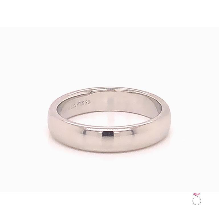 Authentic Tiffany & Co. half round classic wedding band. This band is beautifully crafted in platinum 950 with high polish finish. The band is 4.45 mm wide.  The band is hallmarks 