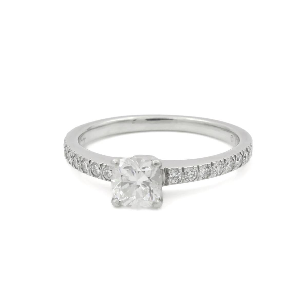 TIFFANY & Co. Platinum Cushion Cut .55ct Diamond Engagement Ring 5.5

Metal: Platinum
Size: 5.5
Center diamond: 1 cushion cut diamond, carat total weight .55, H color, VS1 clarity
Side diamonds: 16 round brilliant cut diamonds, carat total weight