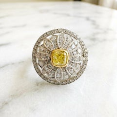 Tiffany & Co. Platinum Ring with Diamonds and Fancy Yellow Center Stone
