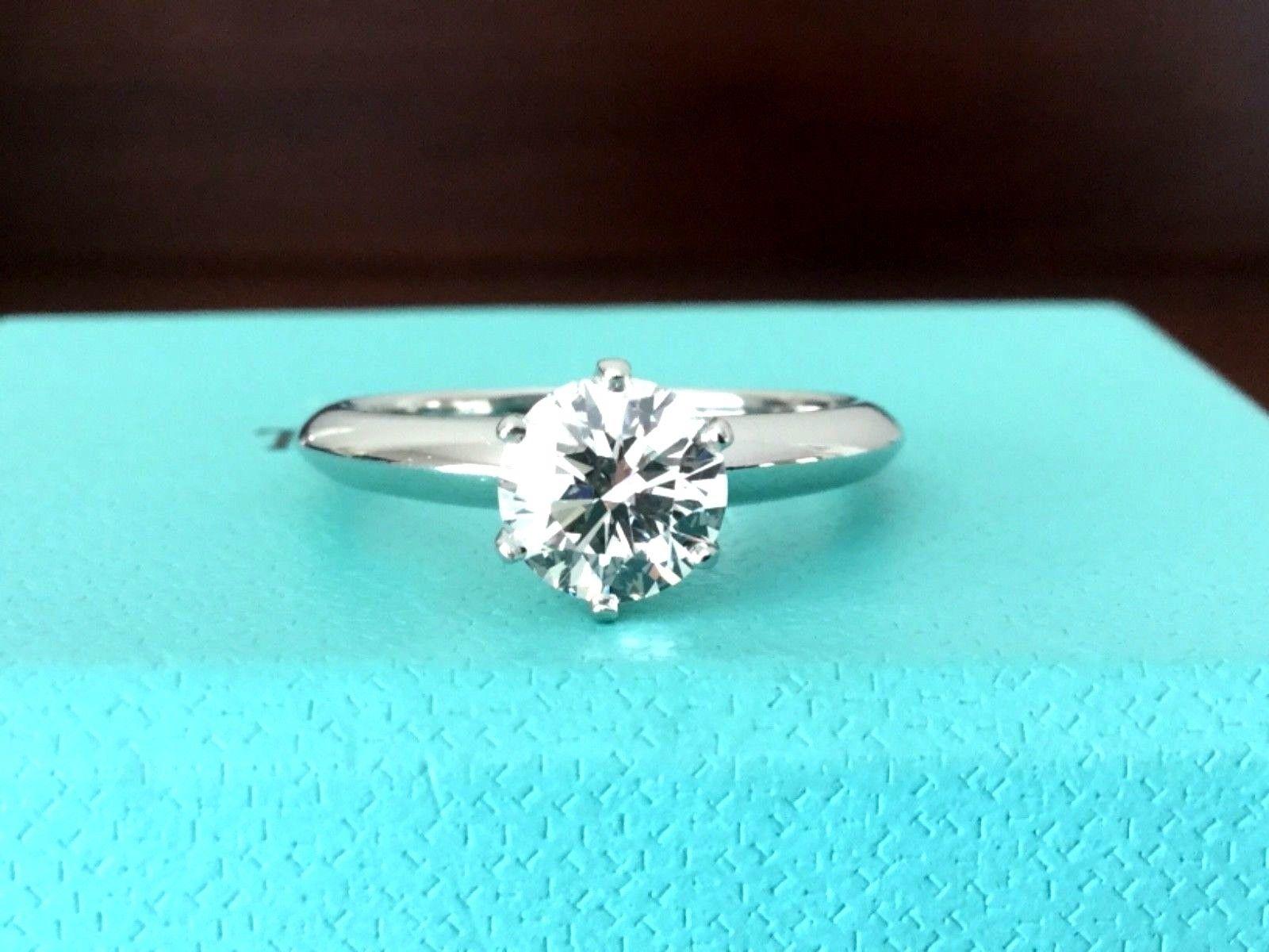 Being offered for your consideration is a stunning Tiffany & Co Platinum and Diamond 1.08 carat natural round engagement ring set in the classic 6 prong setting.  The ring shows like brand new! 

This ring currently retails at Tiffanys for $17,000