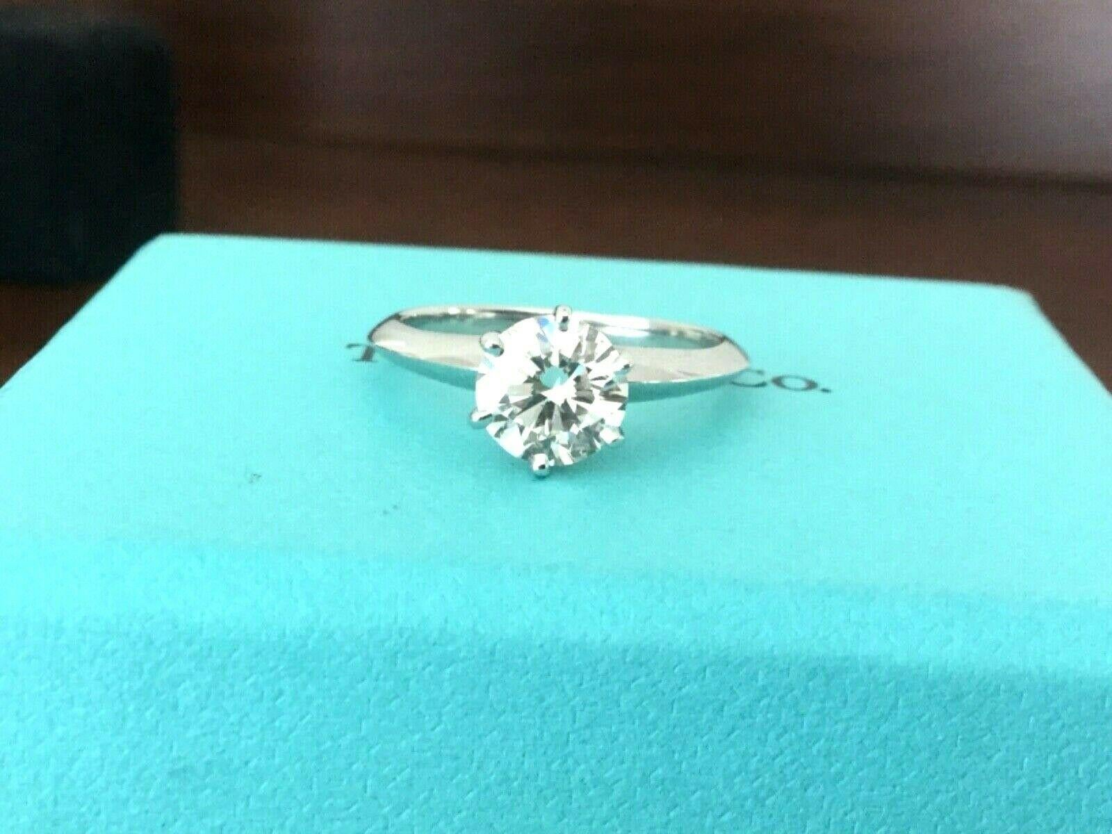 Being offered for your consideration is a like new Tiffany & Co Platinum and Diamond 1.13 carat natural round engagement ring set in the classic 6 prong setting.  This amazing ring was REMOUNTED by Tiffany's into a brand new platinum 6 prong classic