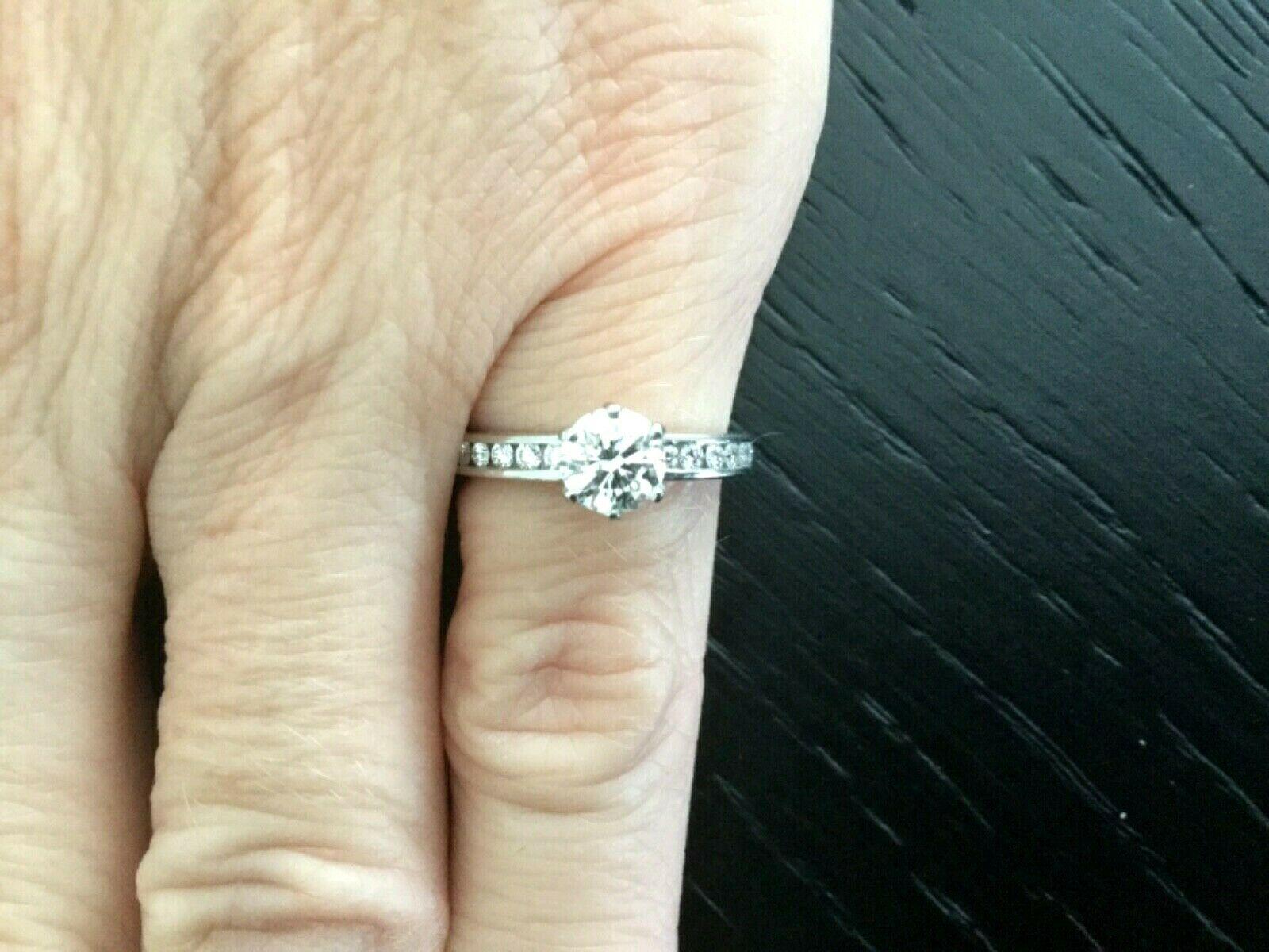 Women's Tiffany & Co. Platinum Diamond .60 Carat H VS1 Triple Exc Round Engagement Ring For Sale