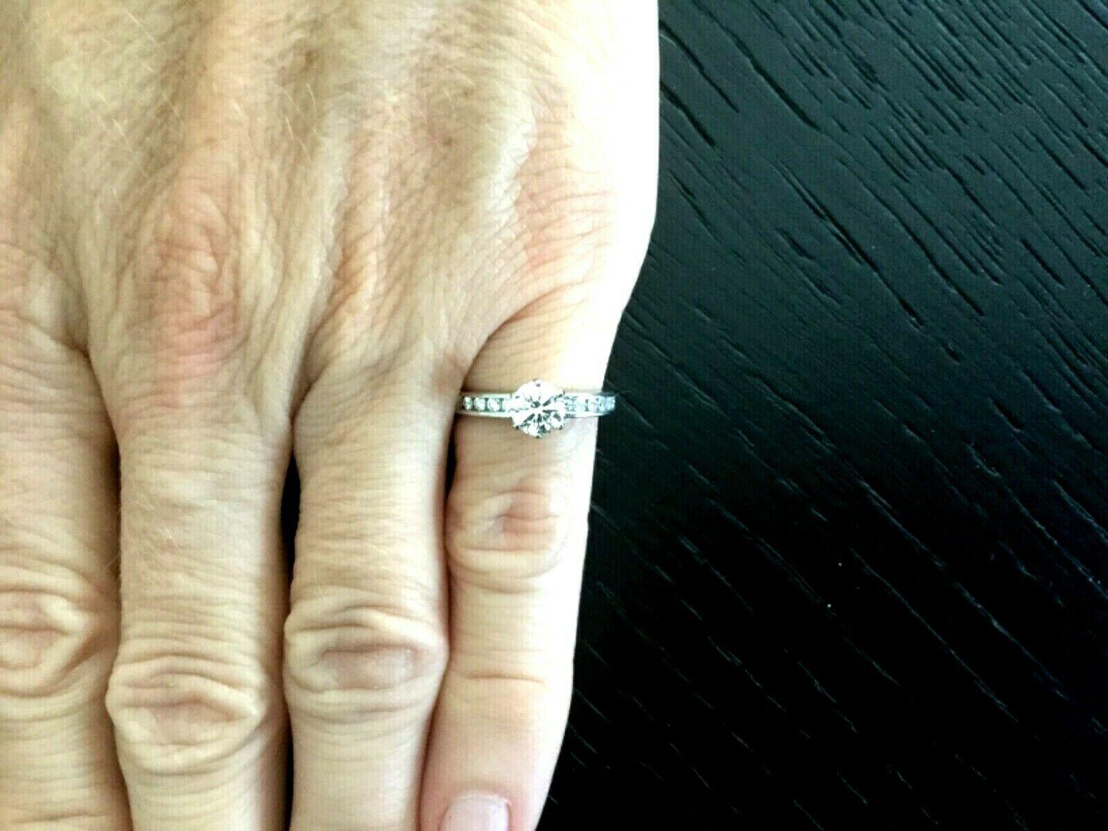 Tiffany & Co. Platinum Diamond .60 Carat H VS1 Triple Exc Round Engagement Ring For Sale 1