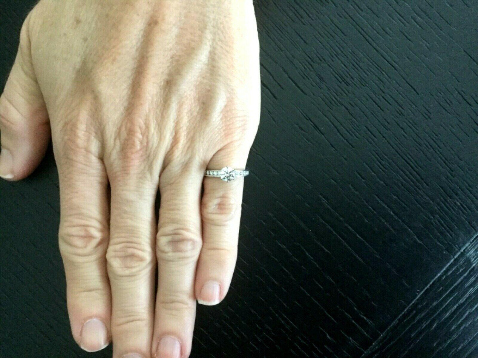 Tiffany & Co. Platinum Diamond .60 Carat H VS1 Triple Exc Round Engagement Ring For Sale 2
