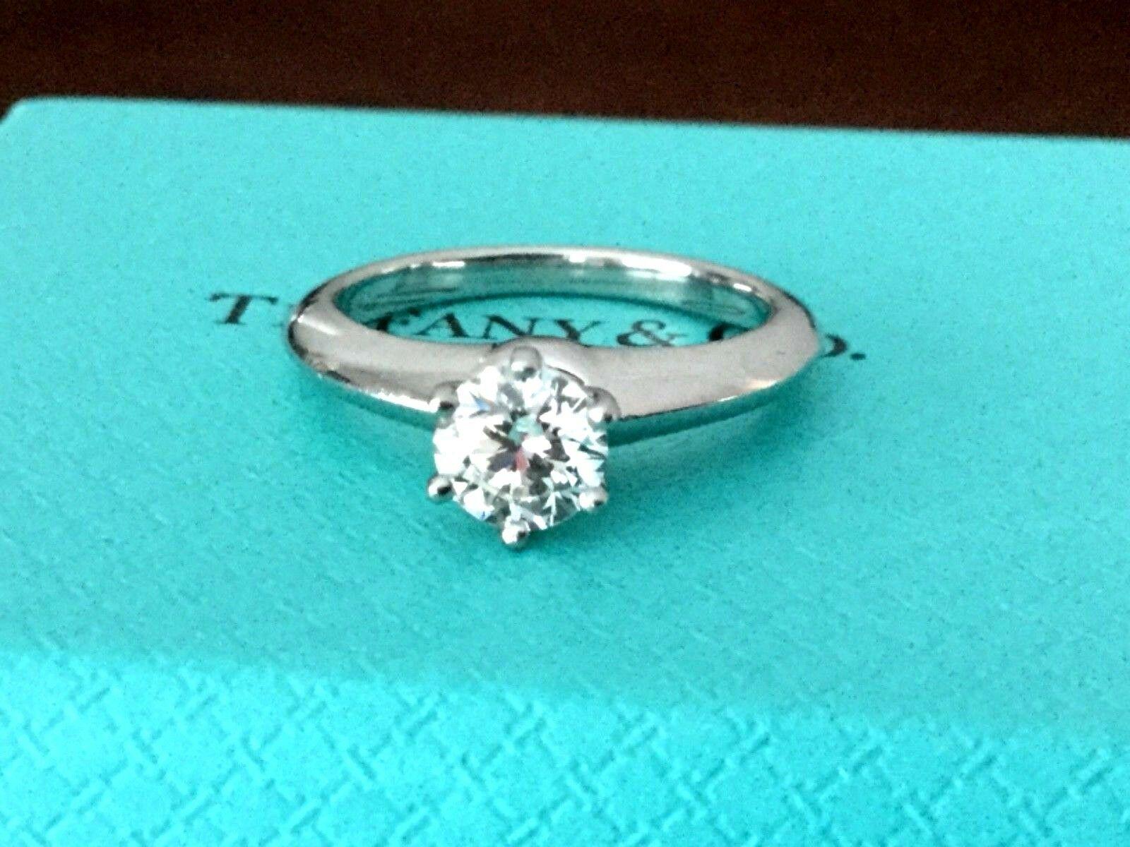 Being offered for your consideration is a like new Tiffany & Co Platinum and Diamond .62 carat natural round engagement ring set in the classic 6 prong setting. 

The ring was purchased in 2015 for $5,562 inc tax and currently retails for $7,000 USD