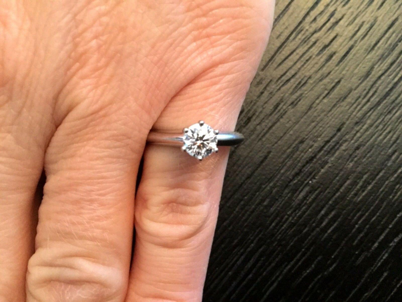 Tiffany & Co. Platinum Diamond .62 Carat Round Engagement Ring I VS1 Triple Exc In Excellent Condition In Middletown, DE