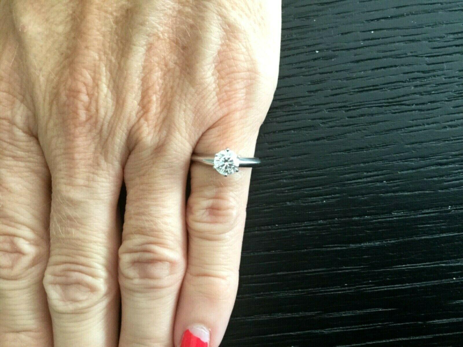 Tiffany & Co. Platinum Diamond .78 Carat Round Engagement Ring I VVS1 In Excellent Condition For Sale In Middletown, DE