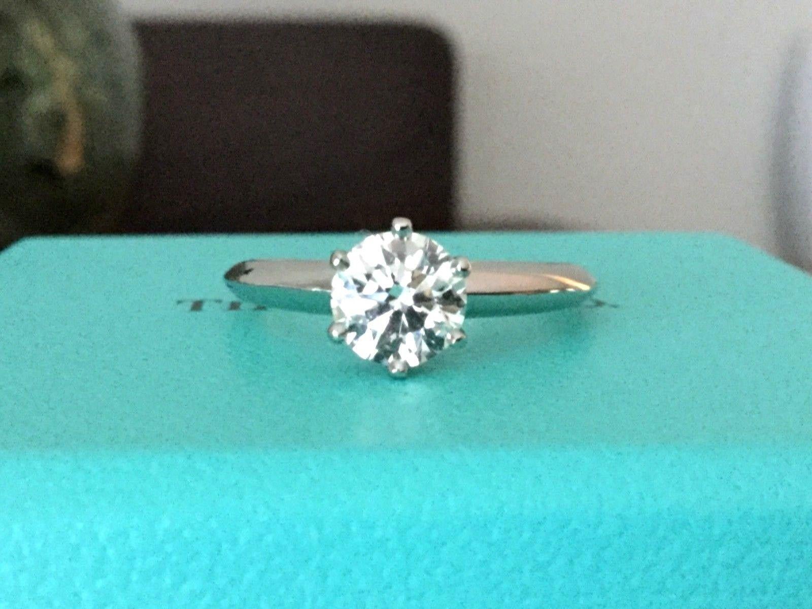 Being offered for your consideration is a beautiful Tiffany & Co Platinum and Diamond  .90 carat natural round engagement ring set in the classic 6 prong setting.  The ring was purchased in 2005 for over $10,000 and was barely worn.  Current retail