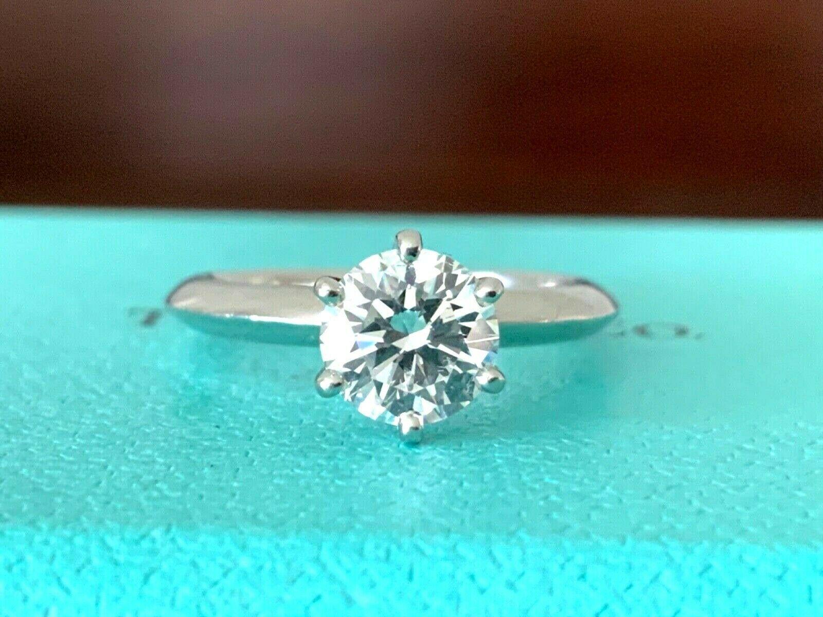 Being offered for your consideration is a like new Tiffany & Co Platinum and Diamond .90 carat natural round engagement ring set in the classic 6 prong setting.  This amazing ring looks like a brand new ring! It was purchased at the end of 2017 for