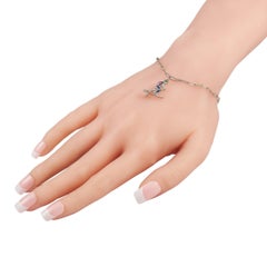 Tiffany & Co. Platinum Diamond, Amethyst, Emerald, & Sapphire Ski Charm Bracelet