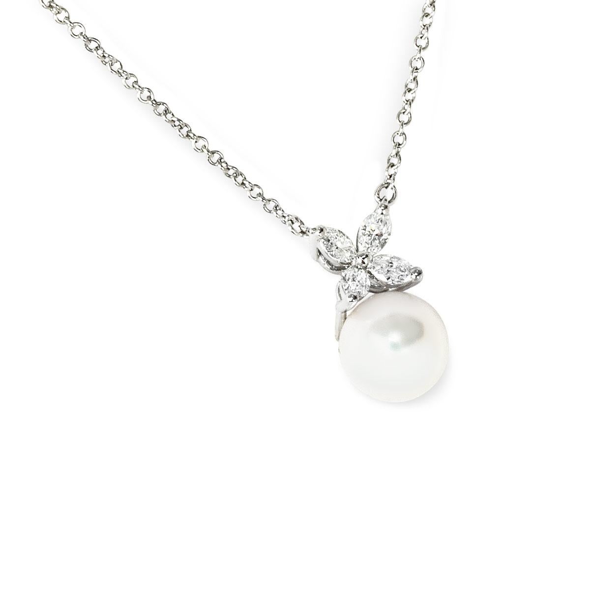 A dainty platinum diamond and pearl Tiffany & Co. necklace from the Victoria collection. The necklace comprises of 4 marquise cut diamonds in a clawed setting with a South Sea cultured pearl placed at the bottom. The diamonds have a total weight of