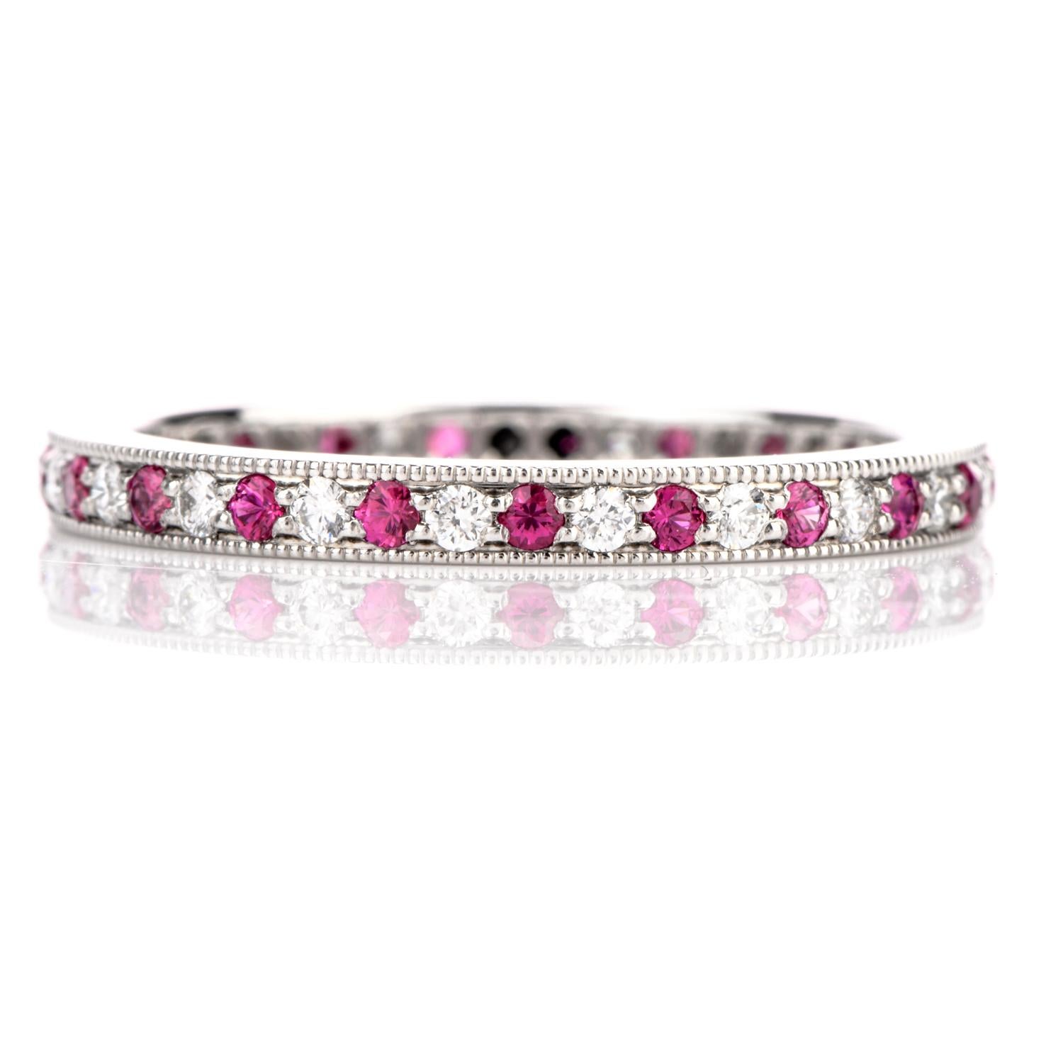 This Timeless Legacy Collection Tiffany and Co Diamond and Pink Sapphire Eternity Band is crafted in 

luxurious Platinum . Alternating completely around this ring are prongset Diamonds and Pink Sapphire cuddled by

a soft beaded edge to finish the