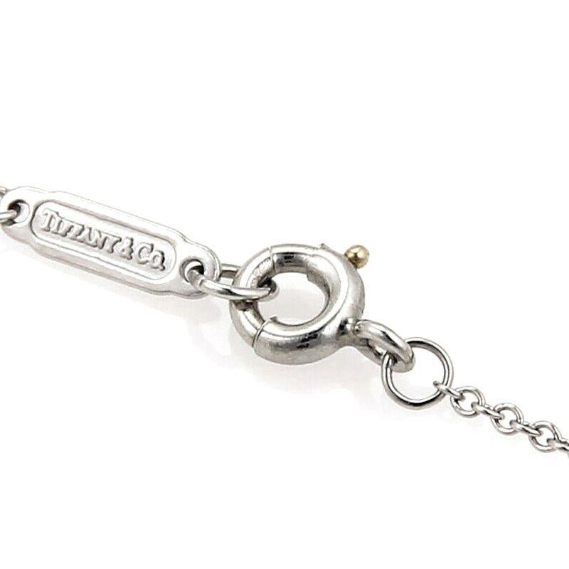 TIFFANY & Co. Collana con ciondolo a croce cruciforme in platino e diamanti in vendita 1