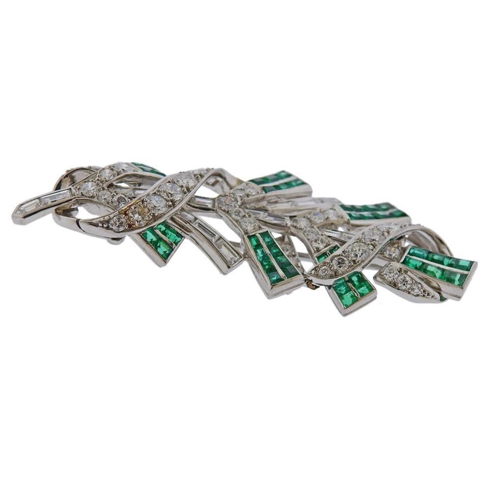 Platinum Tiffany & Co brooch with emeralds and diamonds approx. 2.50-2.80ctw in diamonds. Measures - 55mm x 22mm. Weights 16.1 grams. Marked Tiffany & Co Irid Plat.