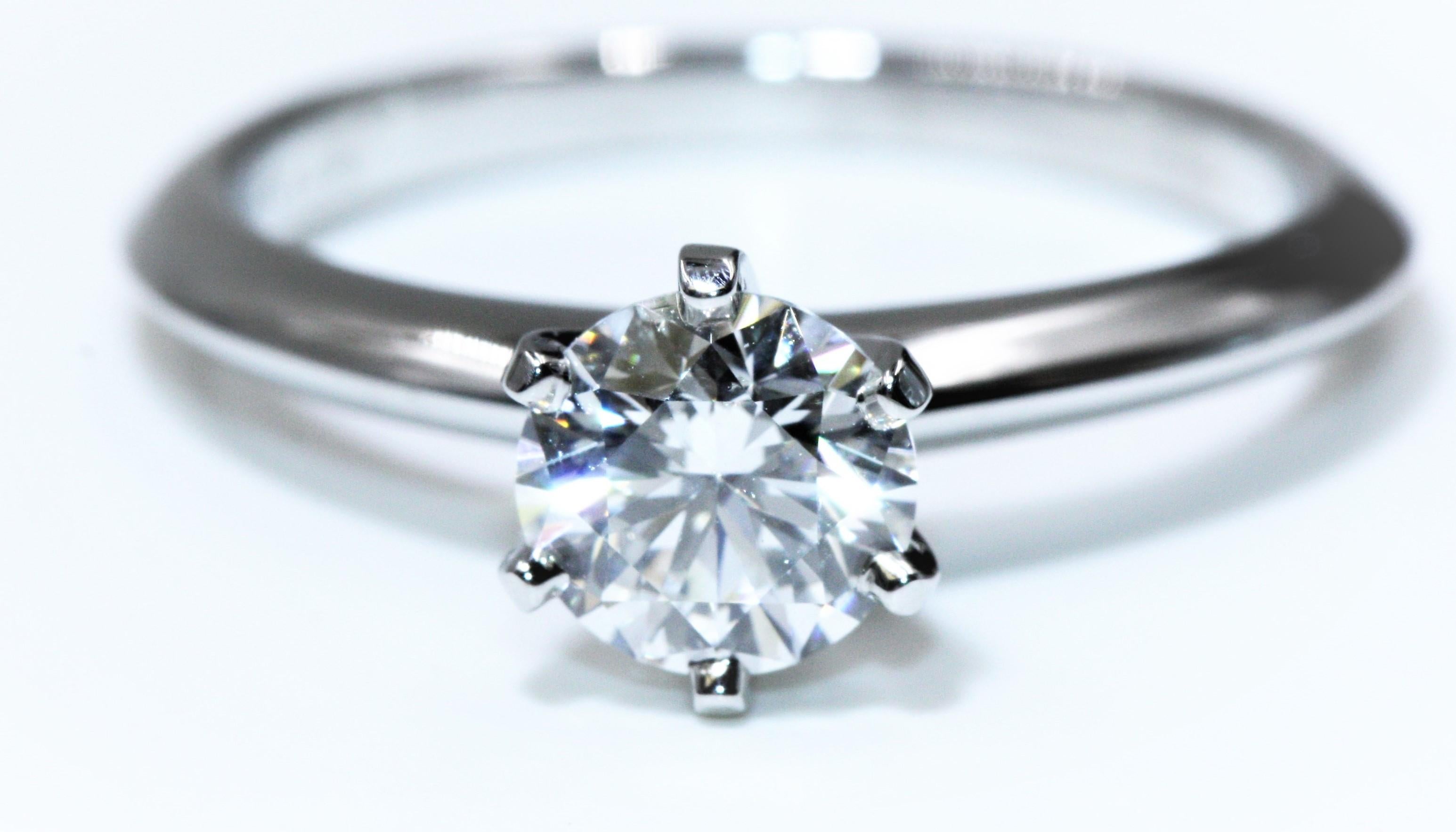 Tiffany & Co. Platinum Diamond Engagement Ring 0.83 Carat, SI1, H In Excellent Condition For Sale In New York, NY