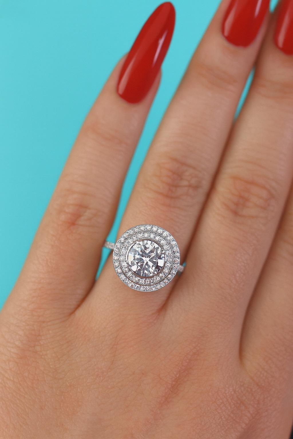 Tiffany & Co. Platinum Diamond Engagement Ring

This exceptional Tiffany & Co. engagement ring features a certified round brilliant cut diamond weighing 2.88 carats, inscribed with 