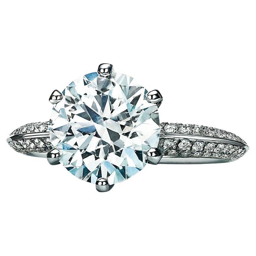 Tiffany & Co. Bague de fiançailles en platine - 1.31 carat F/VS1 Triple Excellent

Cette exquise bague de fiançailles Tiffany & Co. présente un diamant rond brillant de 1,31 carat, de couleur F, de pureté VS1, de taille, de polissage et de symétrie