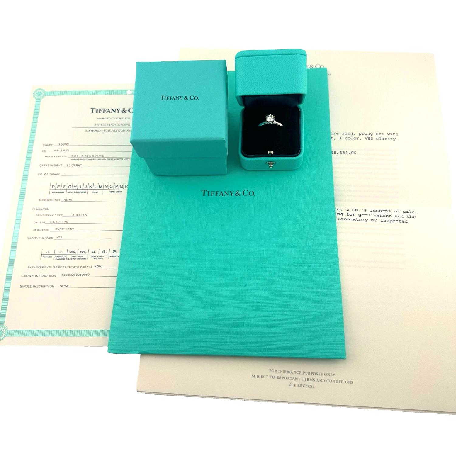 Tiffany & Co Diamond Solitaire Engagement Ring
Style:  6 - Prong Solitaire
Ref. number:  3684**** / Q1028****
Metal:  Platinum PT950
Size / Measurements:  4.75 - sizable
Main Diamond:  Round Brilliant Diamond 0.83 cts
Color & Clarity:  I,
