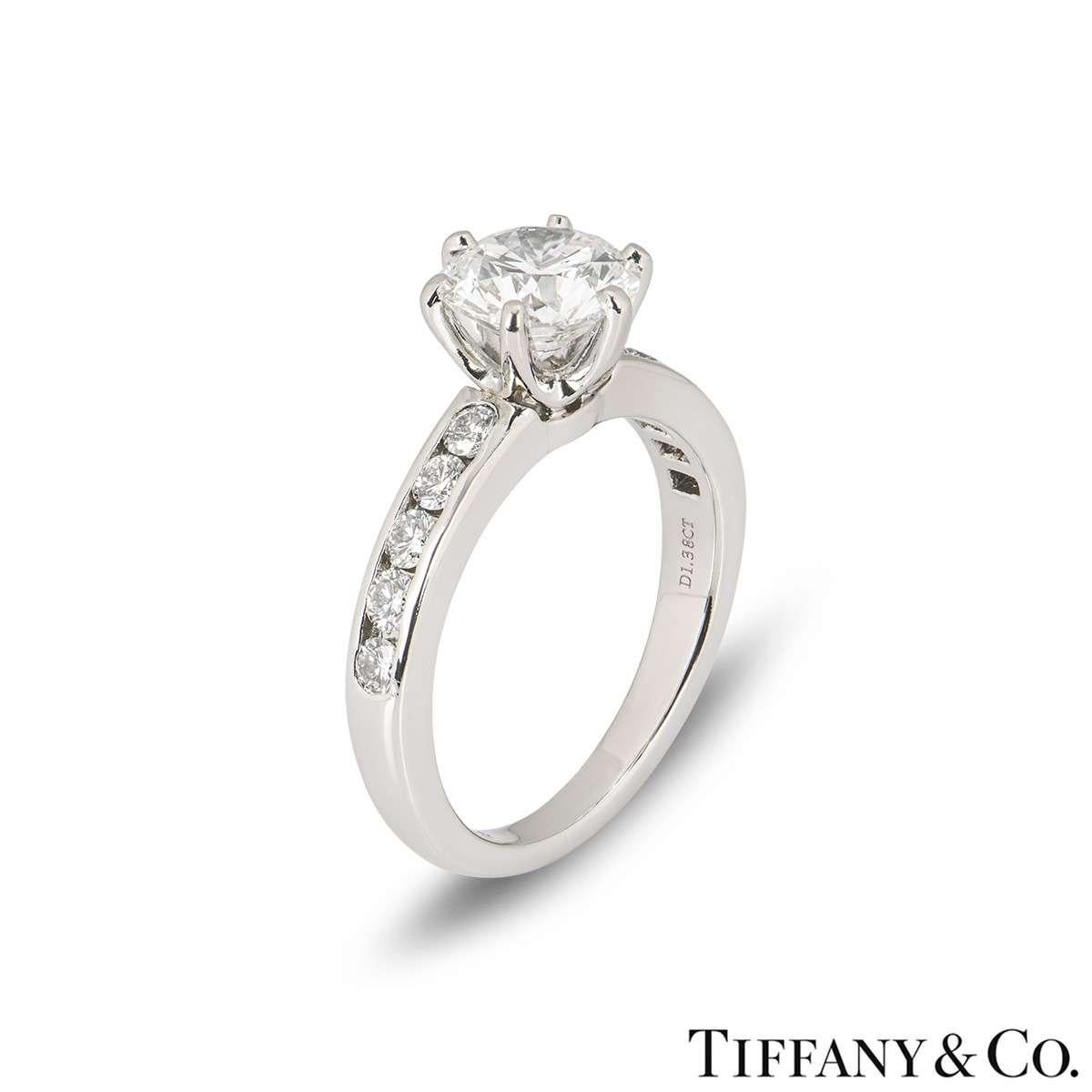 An elegant platinum diamond ring by Tiffany & Co. from the Setting collection. The ring comprises of a round brilliant cut diamond in a prong setting with a weight of 1.38ct, G colour and VVS2 clarity. The diamond scores an excellent rating in all