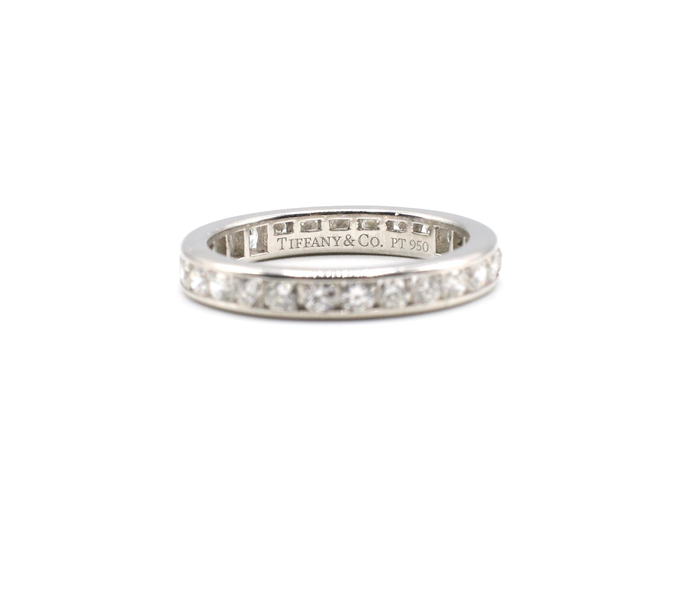 Tiffany & Co Platinum Diamond Wedding Ring 3mm Band Ring Channel Set Round Brilliant Cut Diamonds, .93 CTW With Boxes

Metal: Platinum
Weight: 3.42 grams
Diamonds: 27 round brilliant cut diamonds, approx. .93 CTW G VS 
Finger Size: 5
Signed: