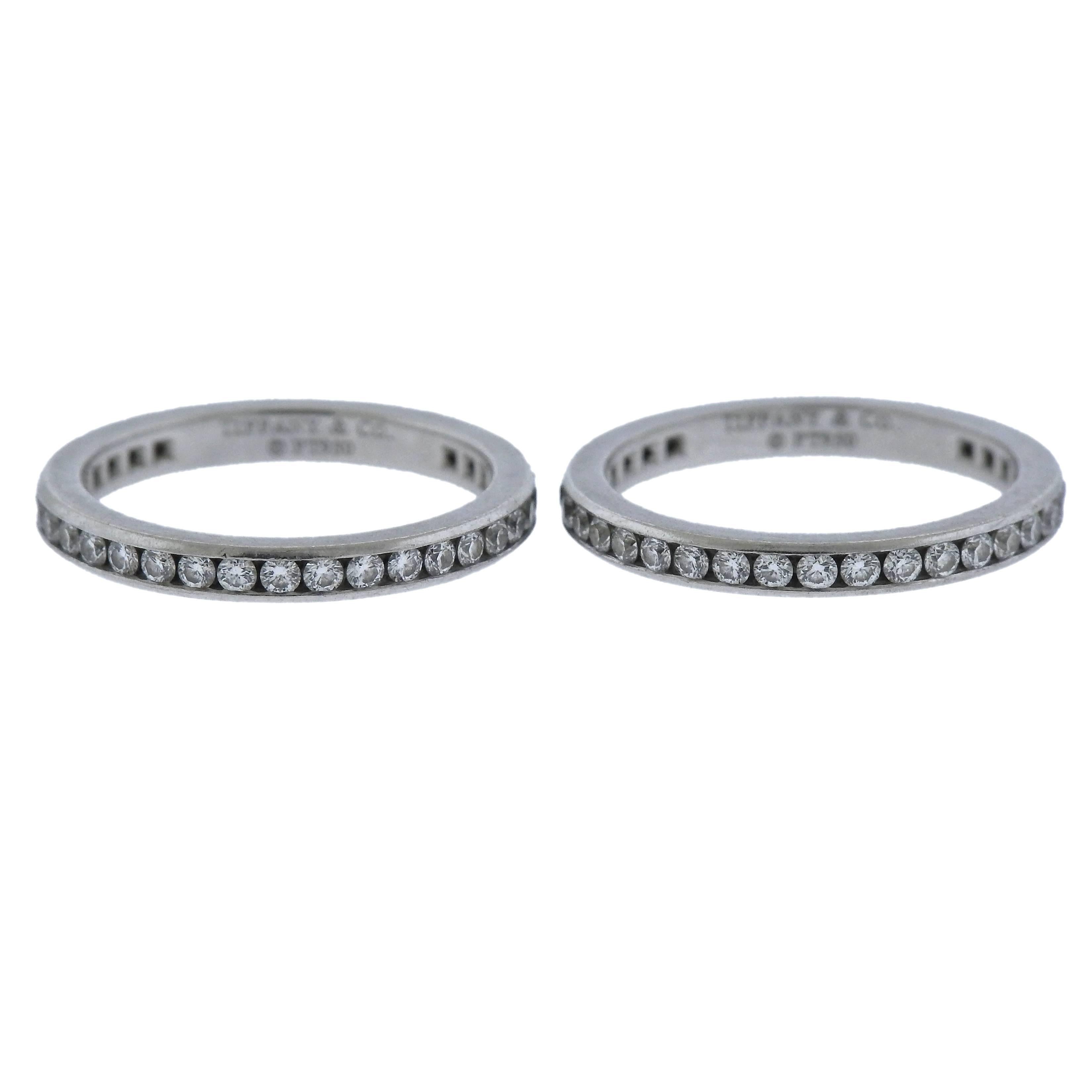 Platinum wedding band ring set, designed by Tiffany & Co, decorated with a total of approx. 0.72ctw in G/VS diamonds. Ring sizes - 4.5 each, bands are 2.3mm wide, weigh 6 grams. Marked: Tiffany & Co, pt950.