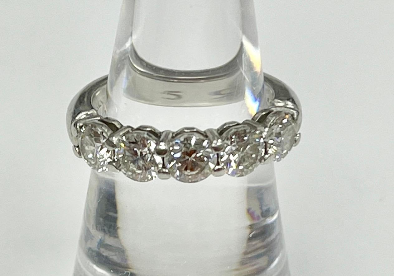 Tiffany & Co. platinum round brilliant cut diamond 5 stones ring
5 diamonds approx 2.00 cts E-F color VS clarity 
weight: 7.8 g ring size: 5.5 
marked Tiffany & Co. PT 950 and serial numbers 
