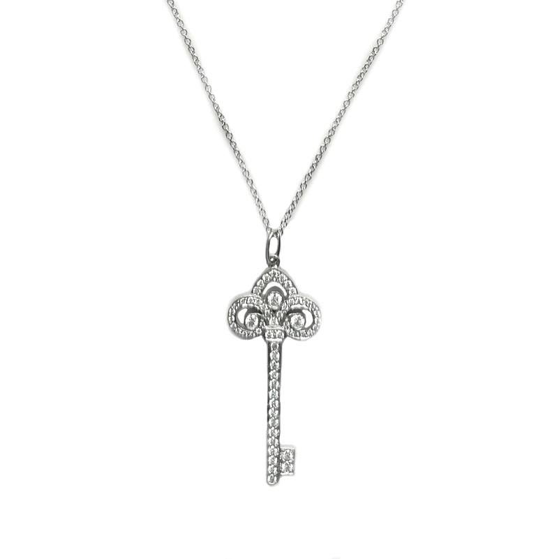 Round Cut TIFFANY & Co. Platinum Diamond Fleur De Lis Key Pendant Necklace For Sale