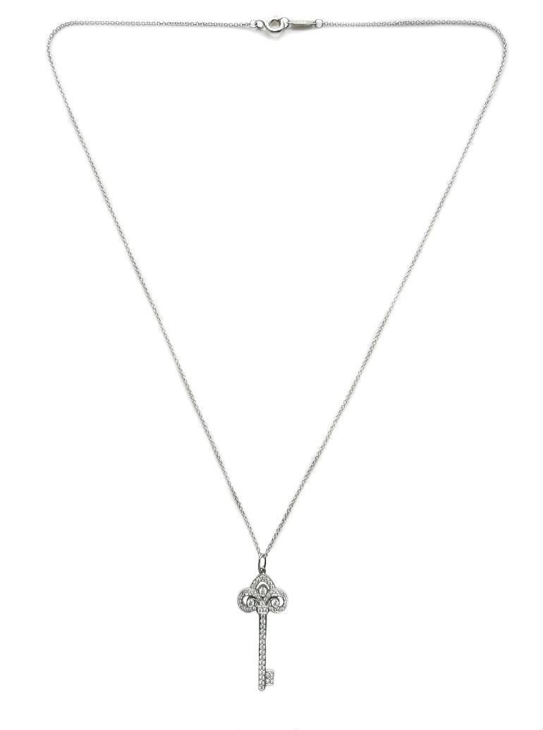 TIFFANY & Co. Platinum Diamond Fleur De Lis Key Pendant Necklace In Excellent Condition In Los Angeles, CA