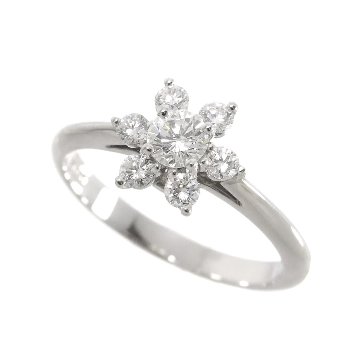 TIFFANY & Co. Platinum Diamond Flower Ring 5.5

Metal: Platinum
Size: 5.5 
Weight: 3.80 grams 
Diamond: 7 round brilliant diamonds, carat total weight .50 approx.
Hallmark: TIFFANY&CO. PT950 
Condition: Excellent condition, comes with the original