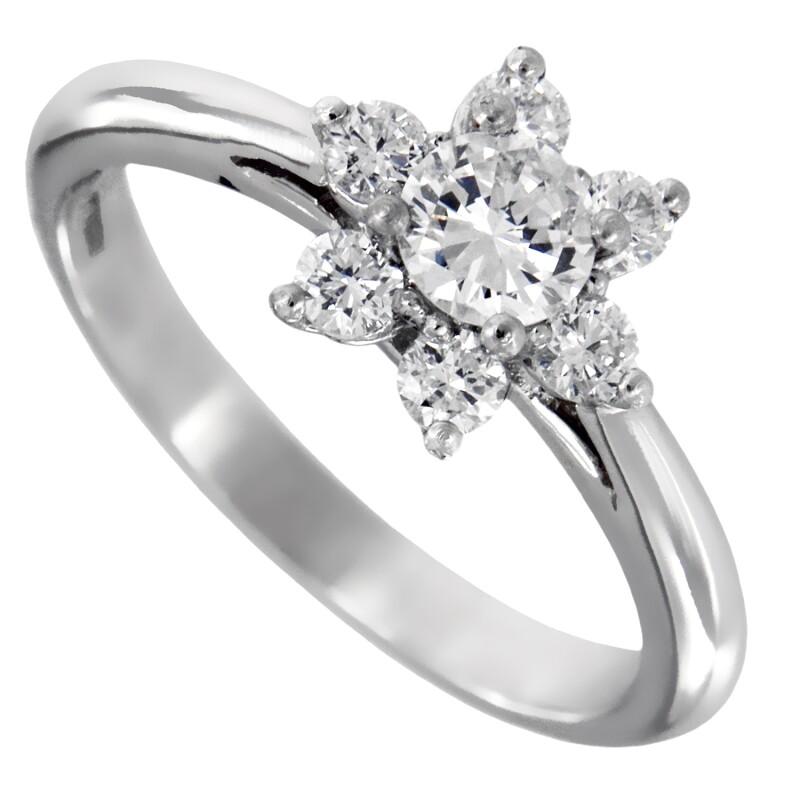 TIFFANY & Co. Platinum Diamond Flower Ring 5.5

Metal: Platinum
Size: 5.5 
Weight: 3.30 grams 
Diamond: 7 round brilliant diamonds, carat total weight .50 approx.
Hallmark: TIFFANY&CO. PT950 
Condition: Excellent condition, comes with the original