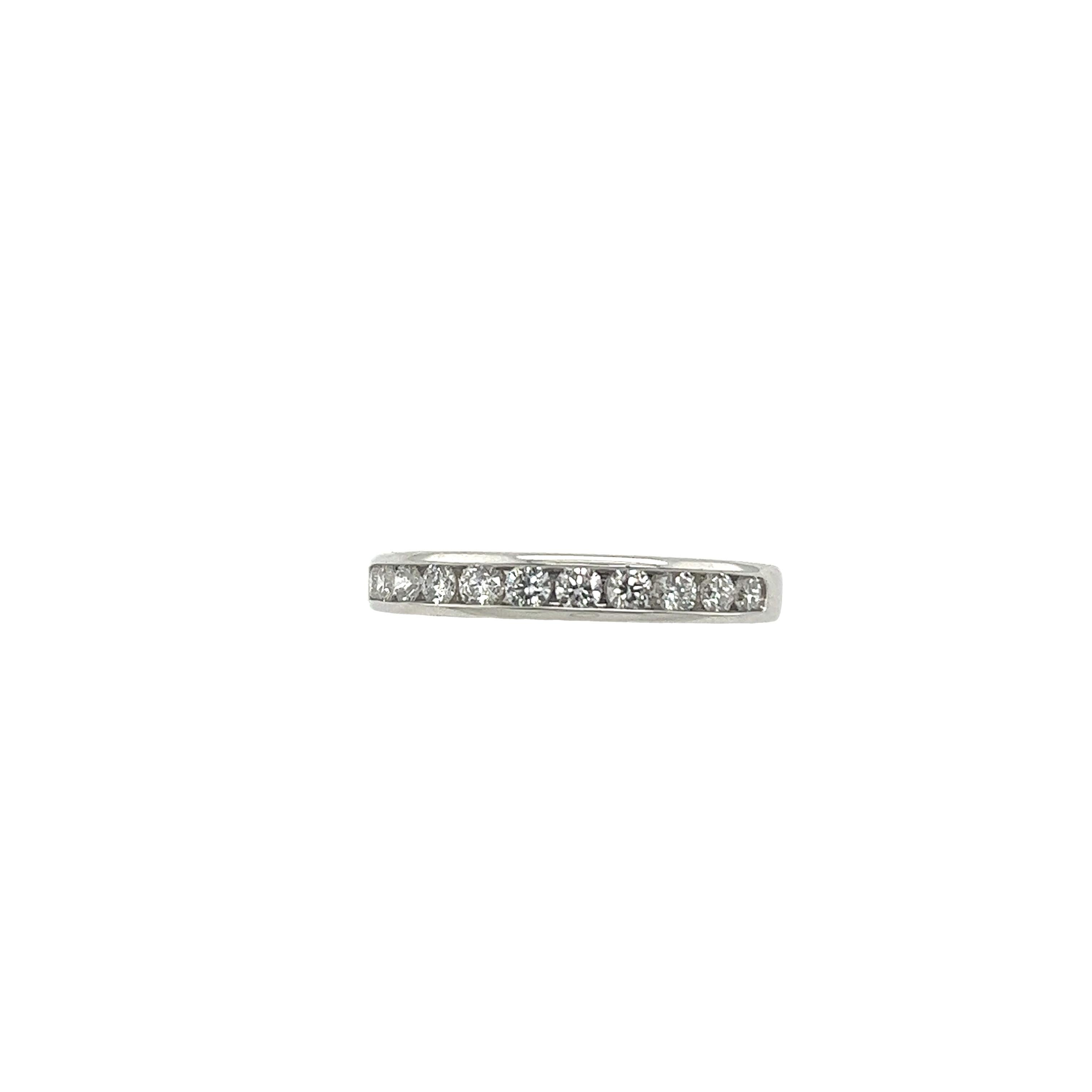 Tiffany & Co. Platinum Diamond Half Eternity Ring set with 11 round Diamonds In Excellent Condition For Sale In London, GB