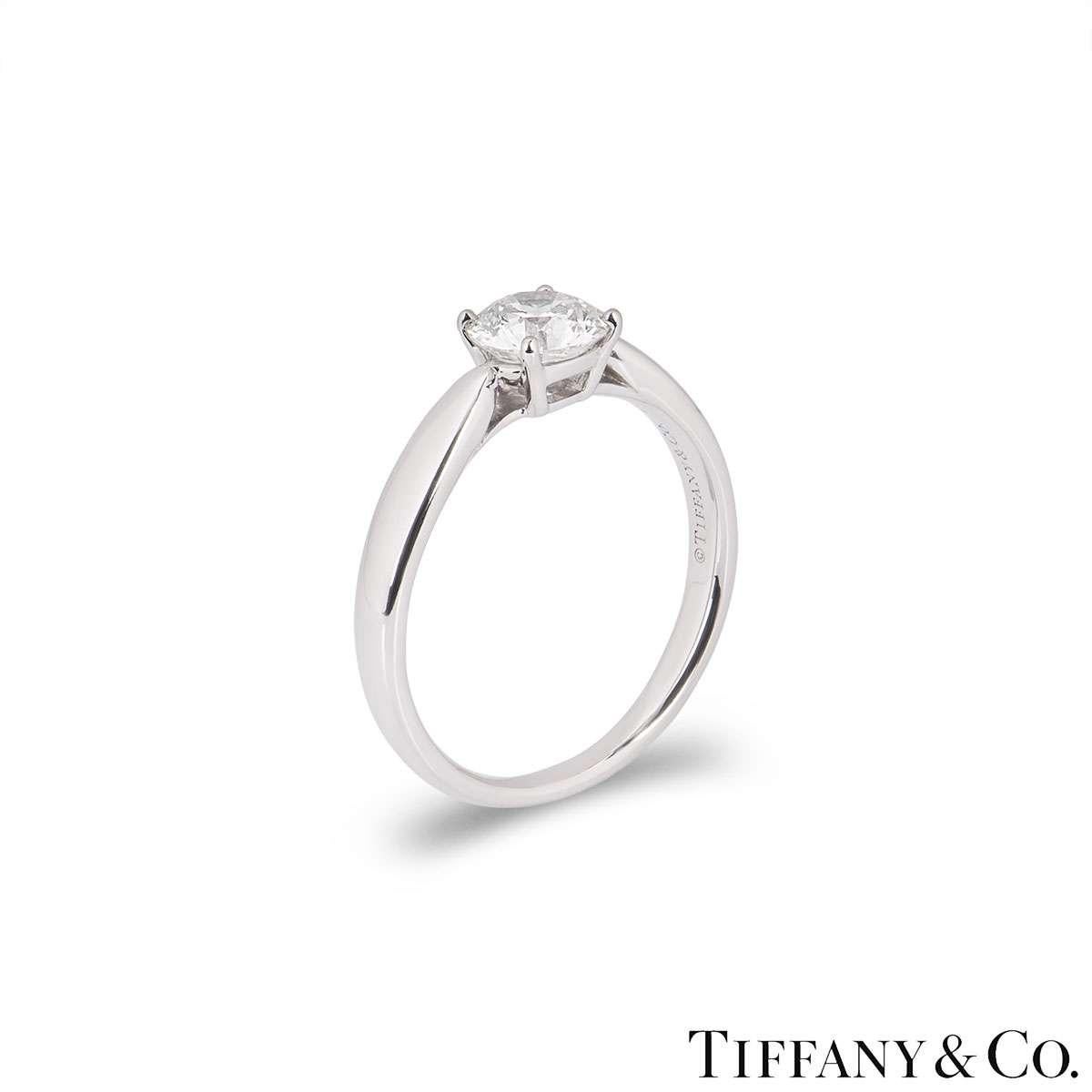 A stunning platinum diamond ring by Tiffany & Co. from the Harmony collection. The ring comprises of a round brilliant cut diamond in a 4 claw setting with a weight of 0.72ct, I colour and VS1 clarity. The diamond scores an excellent rating in all
