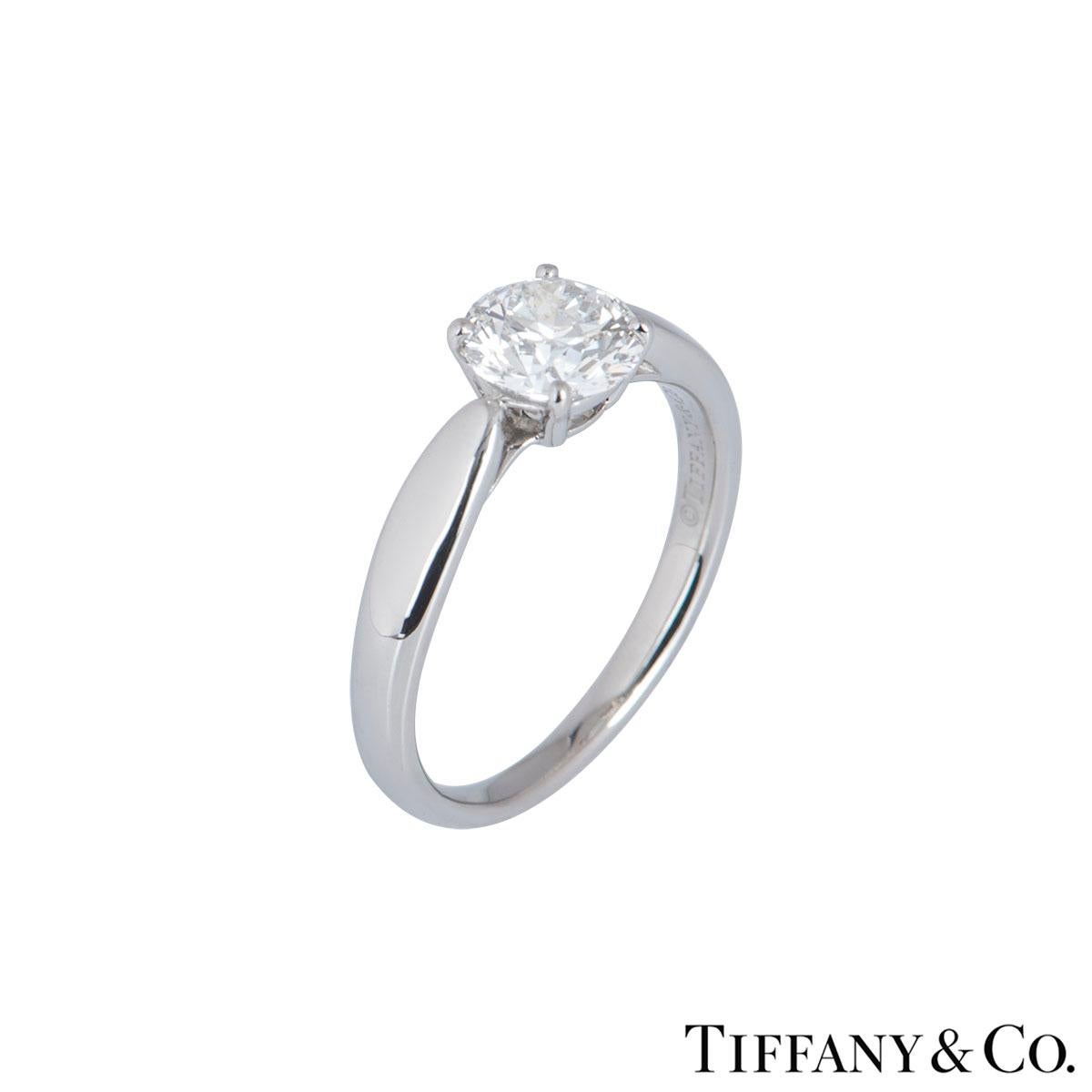 A stunning platinum diamond ring by Tiffany & Co. from the Harmony collection. The ring comprises of a round brilliant cut diamond in a 4 claw setting with a weight of 0.91ct, G colour and VS2 clarity. The ring is a size UK K/US 5/EU 50 but can be