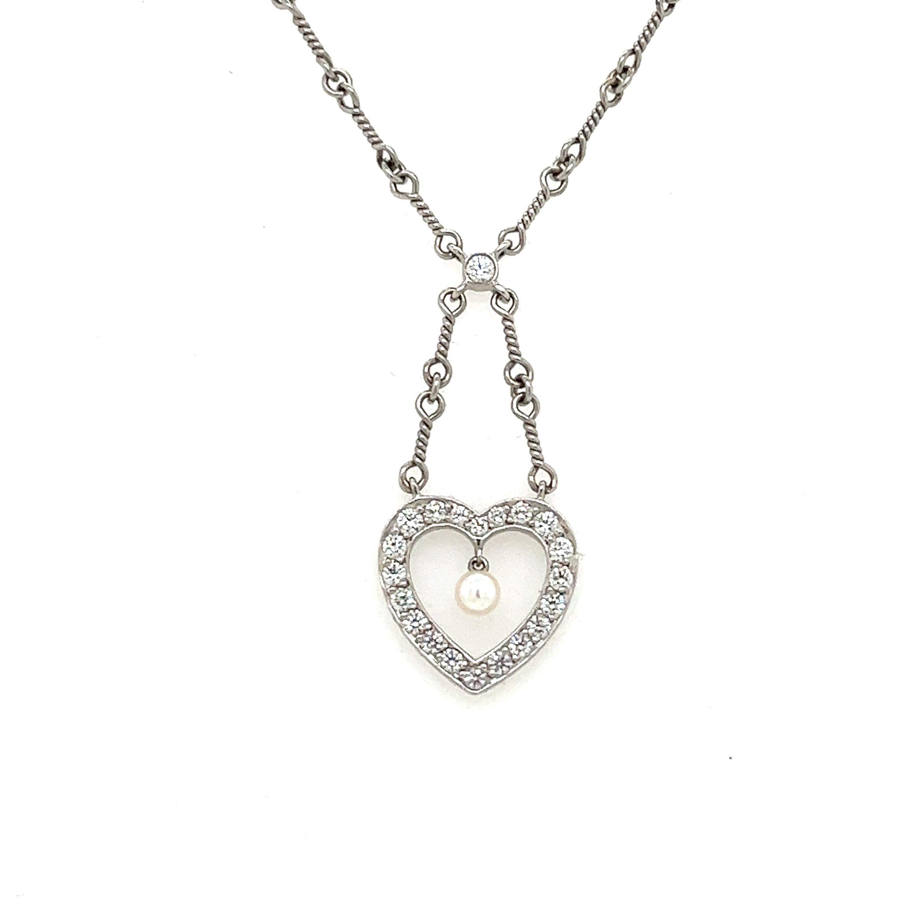   Beautifully crafted necklace by famed designer Tiffany & Co. The necklace is crafted in platinum and showcases a unique wire wrap link that is sure to stand out when worn. 
  The necklace is highlighted with a bezel set diamond that leads to a