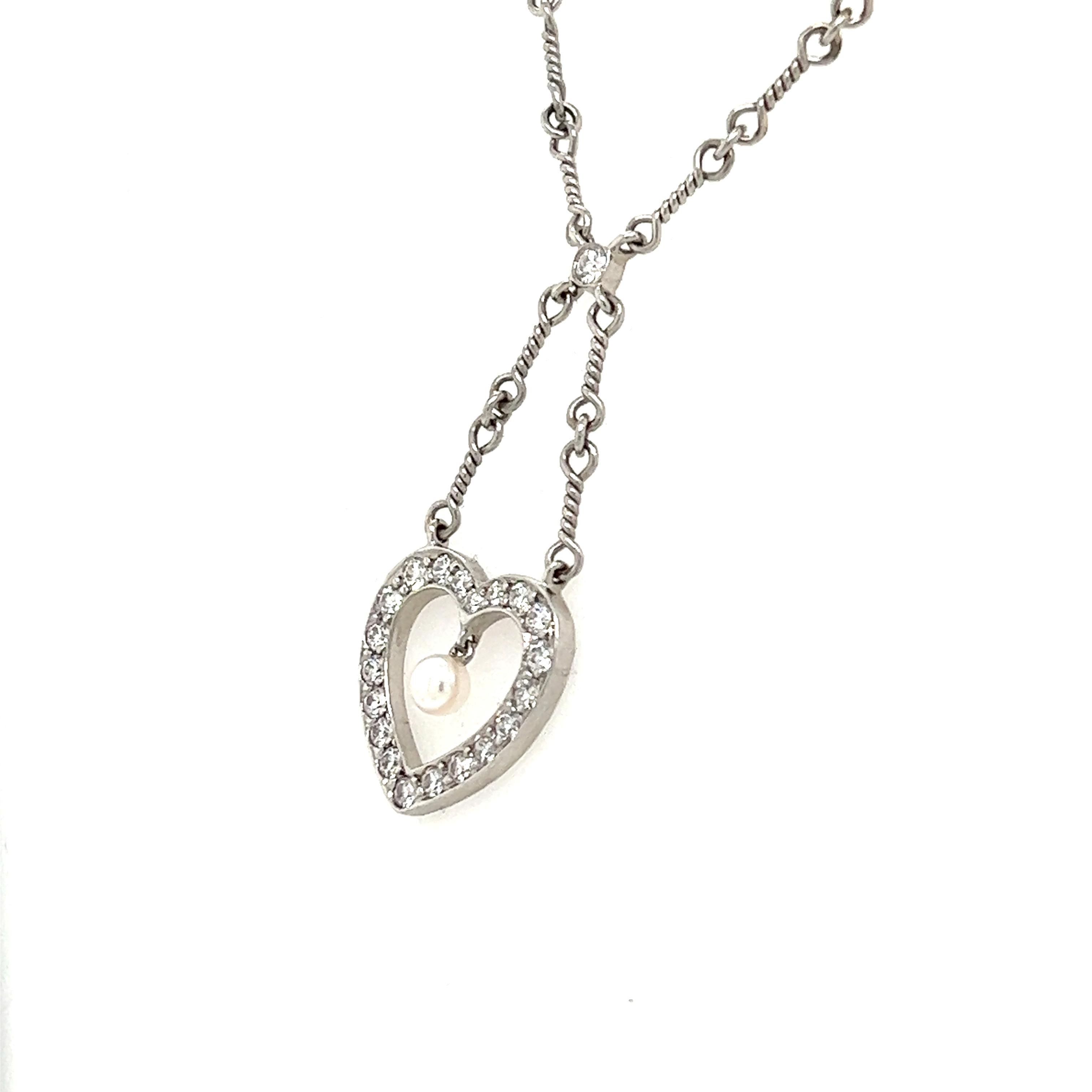 Contemporain Tiffany & Co. Collier à chaîne torsadée avec pendentif en forme de coeur en platine et diamants en vente