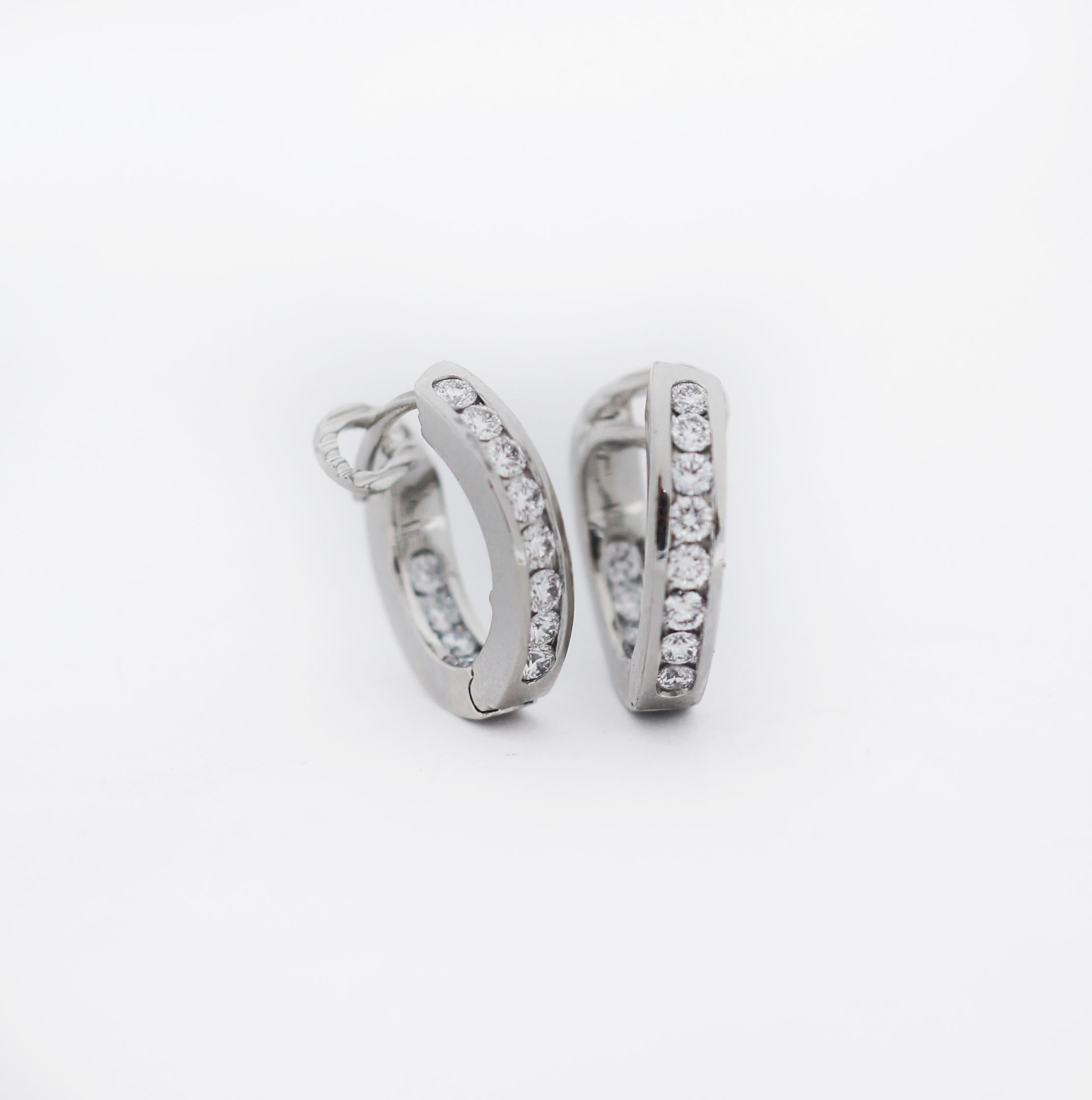 TIFFANY & CO.
Beautiful pair of platinum diamond small hoop earrings
The earrings feature 12 round brilliant cut diamonds set on the outside and inside of each earrings
in a channel setting
approximate total diamond weight of 0.72ct.
The earrings