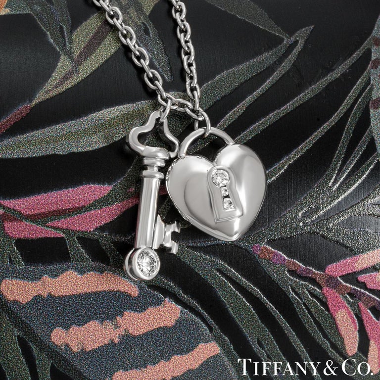 Tiffany and Co. Platinum Diamond Key and Lock Pendant For Sale at 1stDibs  tiffany  lock necklace, lock and key necklace, tiffany heart key necklace