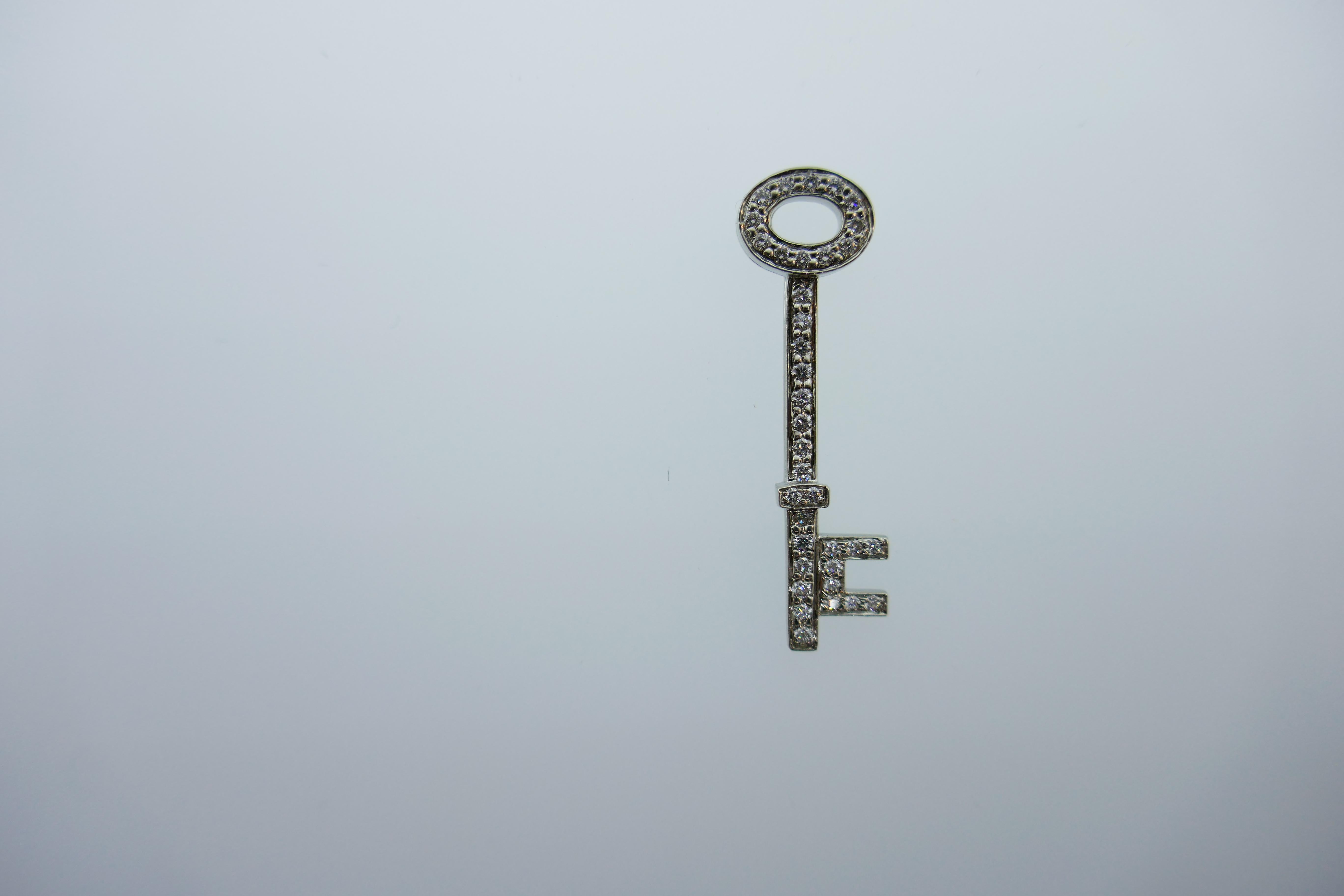 Tiffany & Co. Platinum and Diamond Key Pendant Charm Modern In Excellent Condition In Beverly Hills, CA