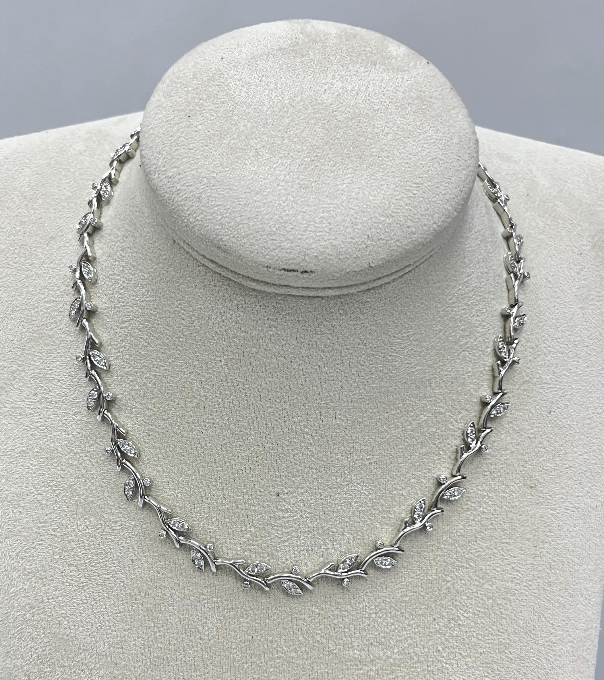 Tiffany & Co Platinum Diamond Leaf Necklace with 102 diamonds approx 4.50 carat total weight
approx D to E color and VVS to VS clarity
Marked: 1999 TIFFANY & CO PT 950
Length: 16 inches x 0.33 inch

