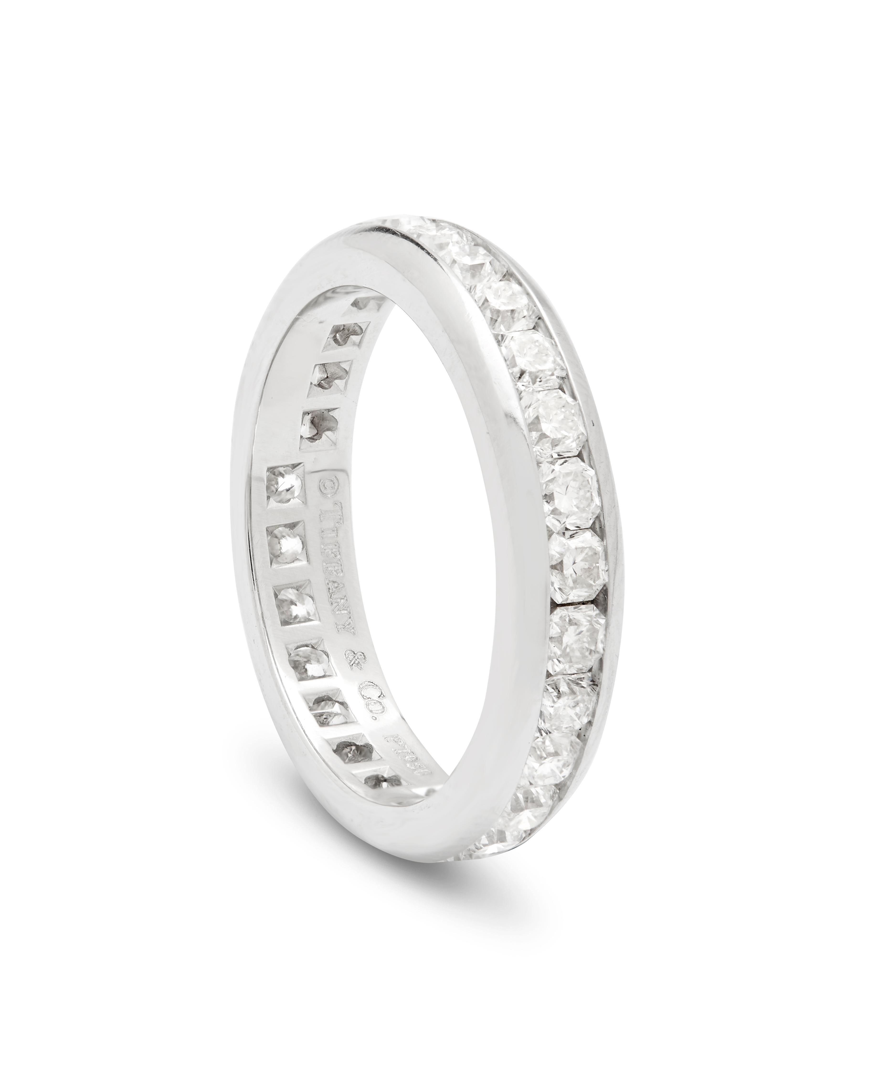 Tiffany & Co Platinum full diamond Lucinda ring. 

A gorgeous Lucida full eternity ring in platinum by Tiffany & Co. The ring has 27 Lucida cut diamonds in a channel setting totalling approximately 1.74ct, predominantly F/G in colour and VS in