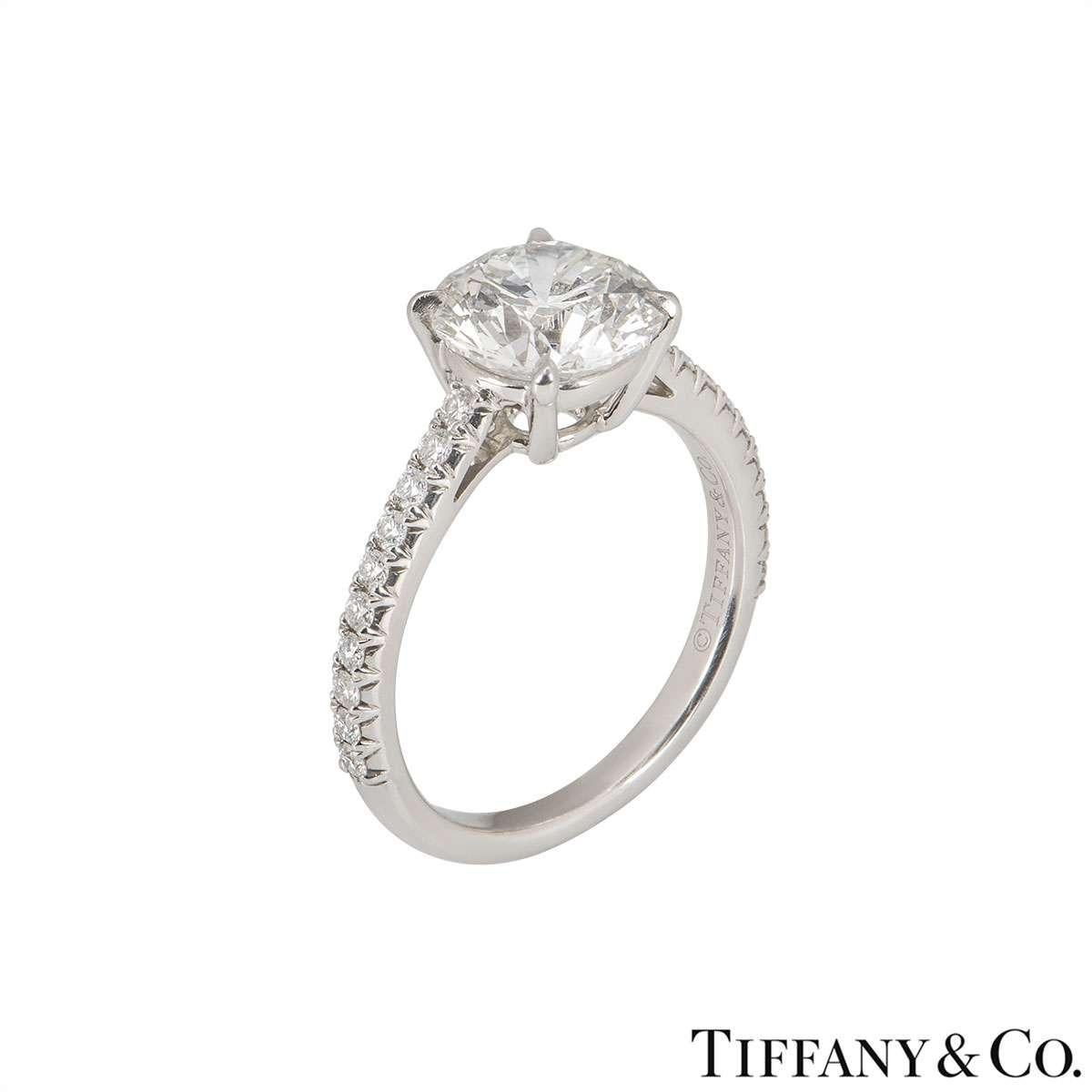 A platinum diamond ring by Tiffany & Co. from the Novo collection. The ring comprises of a round brilliant cut diamond set to the centre in a 4 claw setting with a weight of 1.72ct, G colour and VS1 clarity. The diamond scores an excellent rating in