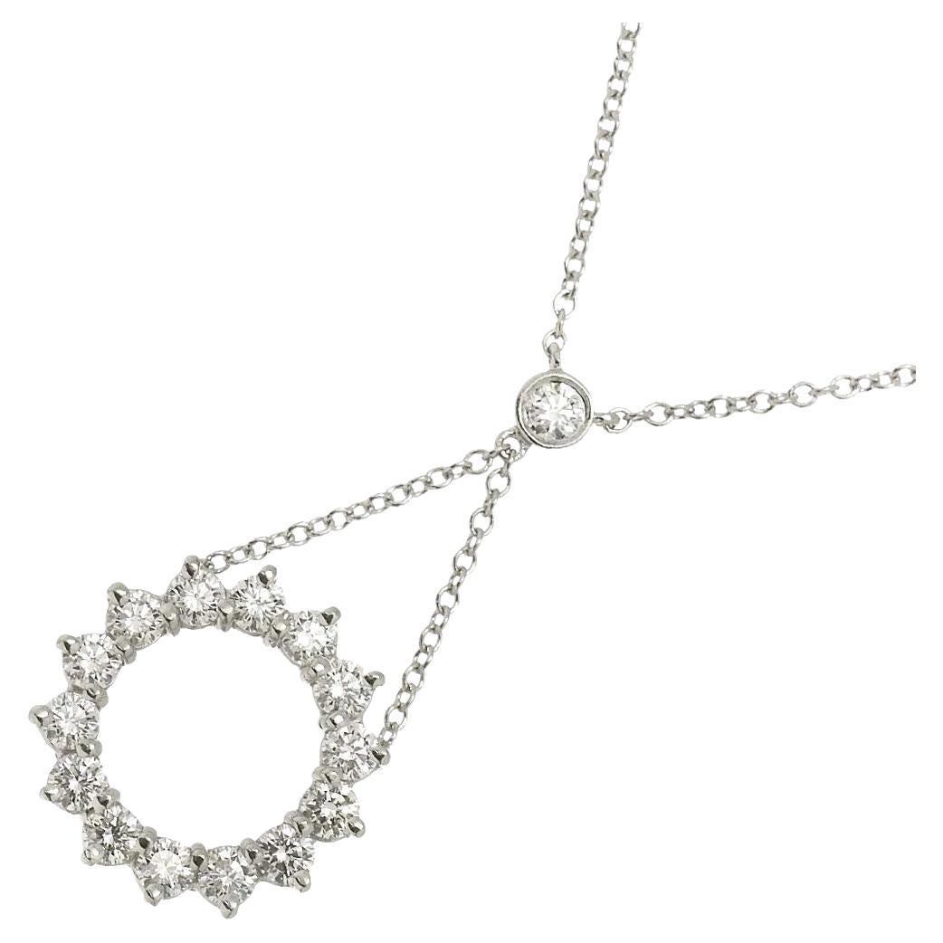 TIFFANY
Co. Collana con ciondolo a forma di cerchio aperto con diamante in platino