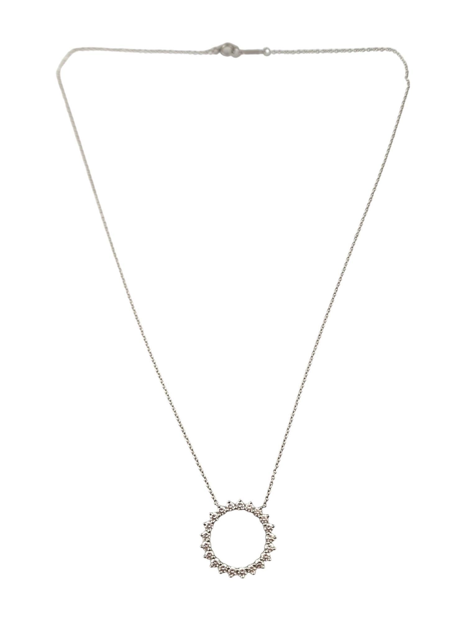 Tiffany & Co Platinum Diamond Open Circle Pendant Necklace 

This gorgeous necklace by designer Tiffany & Co features a beautiful open circle pendant with 21 sparkling round brilliant cut diamonds set in platinum!

Approximate total diamond weight: