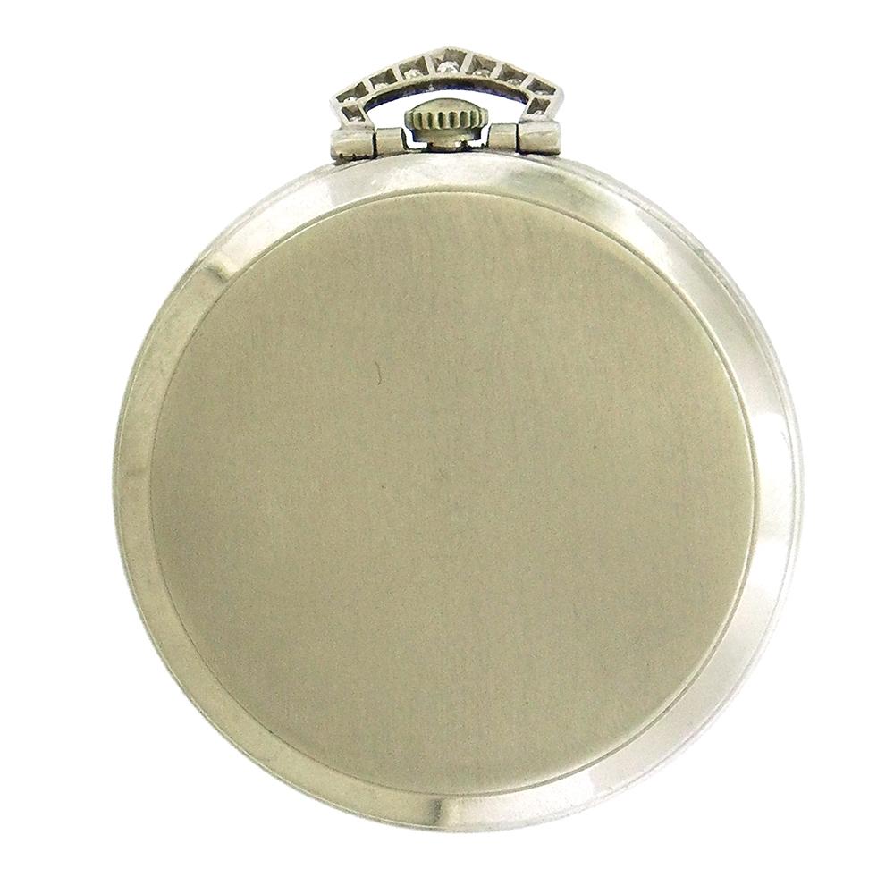 Tiffany & Co open face platinum and diamond pocket watch circa 1940 made for Tiffany by Agassiz Watch Co, Switzerland, is a 44mm slim pocket watch, matte silvered dial with painted black Arabic hours, subsidiary seconds register and blue steel
